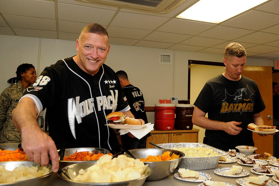 KUNSAN AIR BASE, Republic of Korea -- Gen. Gary L. North, Pacific Air Forces commander, enjoys a home-cooked meal at the chapel’s Sonlight Inn here Aug. 21. The base chapel sponsors a weekly meal each Sunday for Kunsan Airmen. (U.S. Air Force photo/Staff Sgt. Rasheen Douglas)