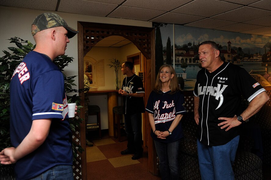 KUNSAN AIR BASE, Republic of Korea -- Gen. Gary L. North, Pacific Air Forces commander, talks with Chaplain (Maj.) Christine Blice-Baum, 8th Fighter Wing, and Airman Basic Jarrett Bradshaw  at the chapel's Sonlight Inn here Aug. 21.  (U.S. Air Force photo/Staff Sgt. Rasheen Douglas)