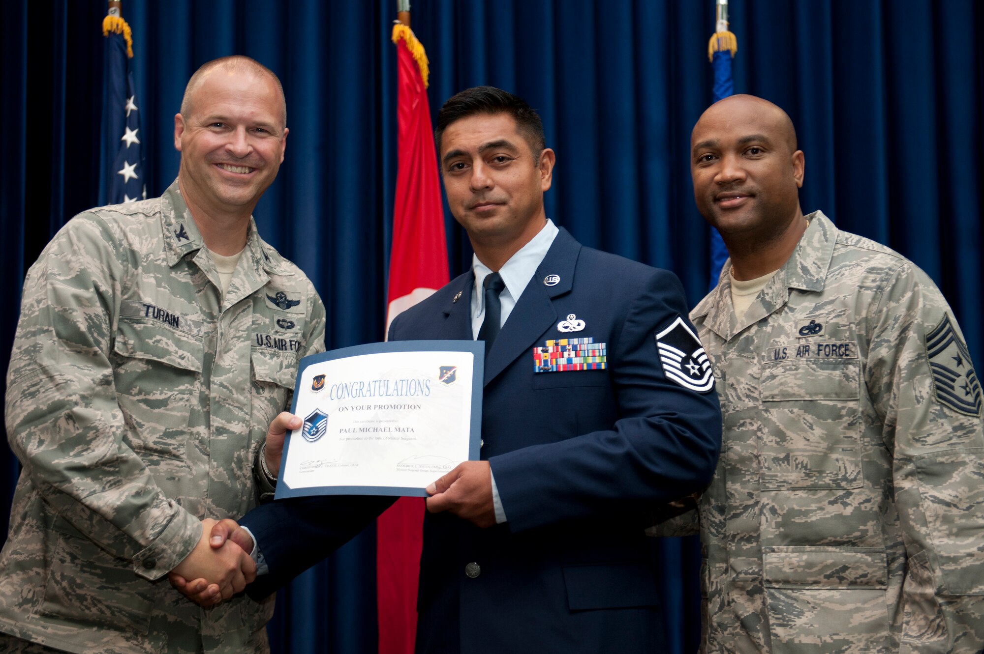 Paul Mata, 728th Air Mobility Squadron, is promoted to the rank of master sergeant Aug. 31, 2011, at the Club Complex ballroom at Incirlik Air Base, Turkey. (U.S. Air Force photo by Tech. Sgt. Michael B. Keller/Released)