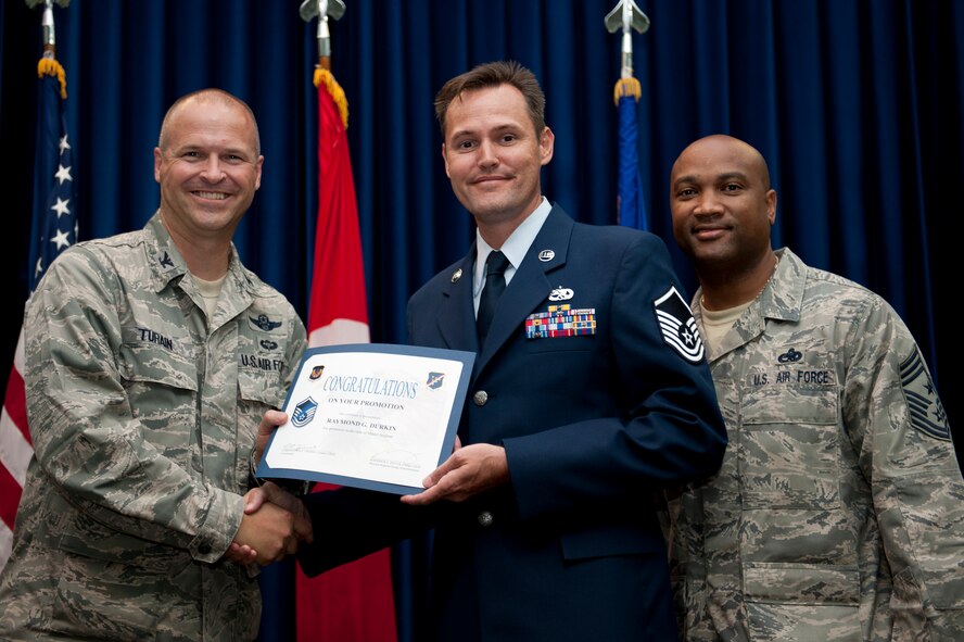 Raymond Durkin, 728th Air Mobility Squadron, is promoted to the rank of master sergeant Aug. 31, 2011, at the Club Complex ballroom at Incirlik Air Base, Turkey. (U.S. Air Force photo by Tech. Sgt. Michael B. Keller/Released)