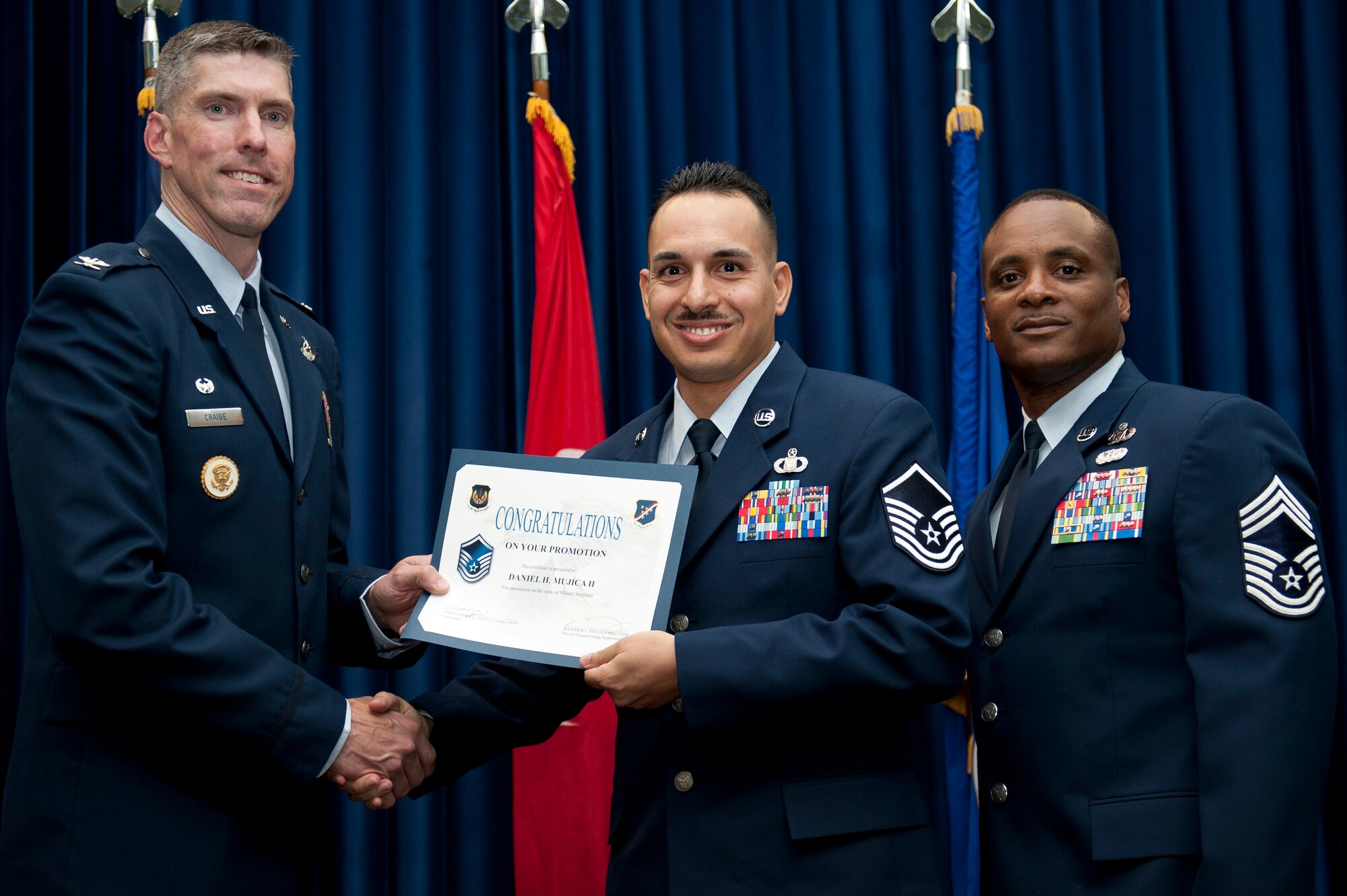 Daniel Mujica II, 39th Air Base Wing Command Post, is promoted to the rank of master sergeant Aug. 31, 2011, at the Club Complex ballroom at Incirlik Air Base, Turkey. (U.S. Air Force photo by Tech. Sgt. Michael B. Keller/Released)