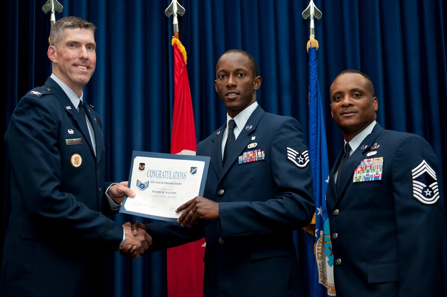 Dedrick Walton, 39th Medical Support Squadron, is promoted to the rank of staff sergeant Aug. 31, 2011, at the Club Complex ballroom at Incirlik Air Base, Turkey. (U.S. Air Force photo by Tech. Sgt. Michael B. Keller/Released)