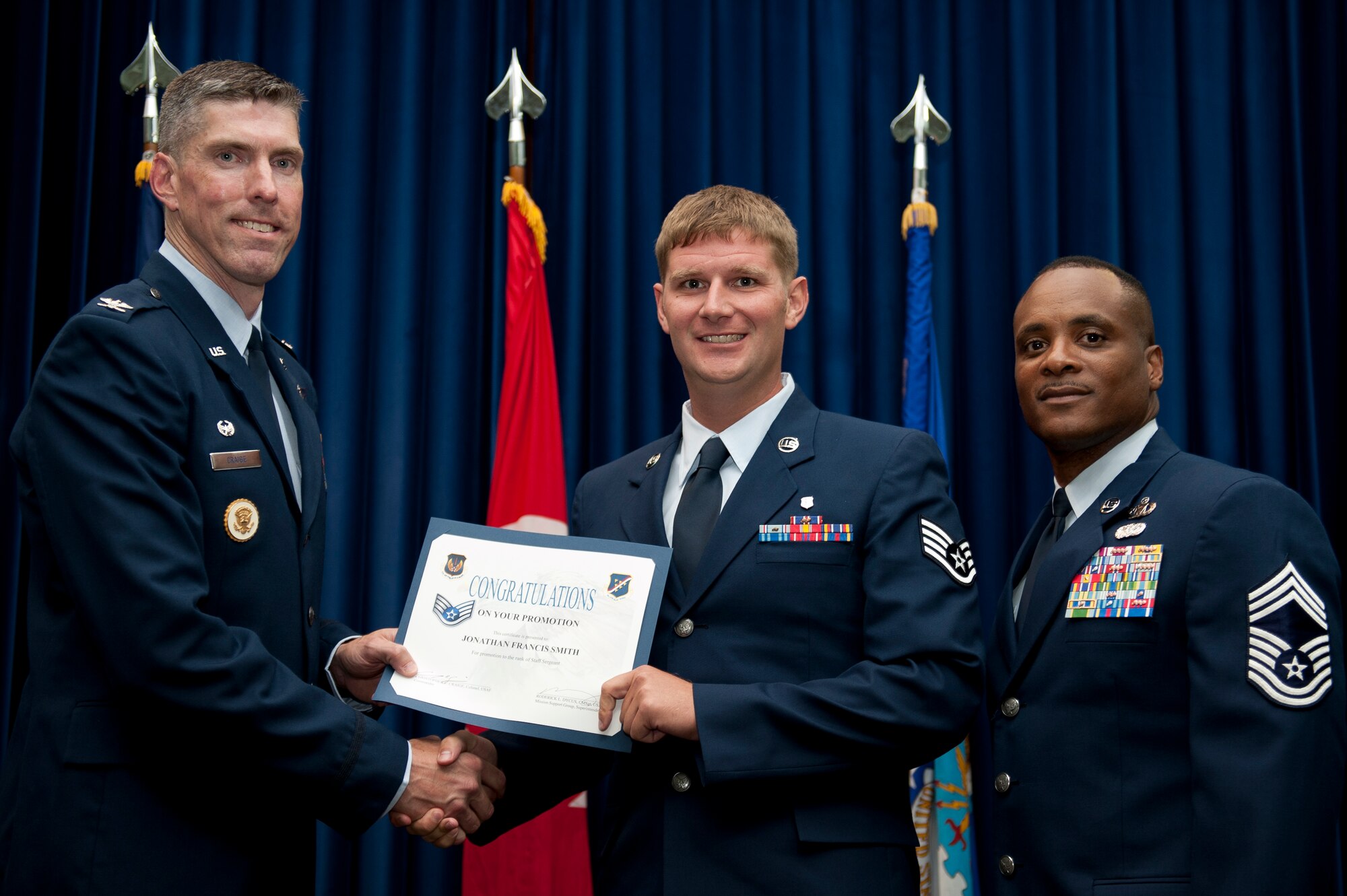 Jonathan Smith, 39th Medical Operations Squadron, is promoted to the rank of staff sergeant Aug. 31, 2011, at the Club Complex ballroom at Incirlik Air Base, Turkey. (U.S. Air Force photo by Tech. Sgt. Michael B. Keller/Released)