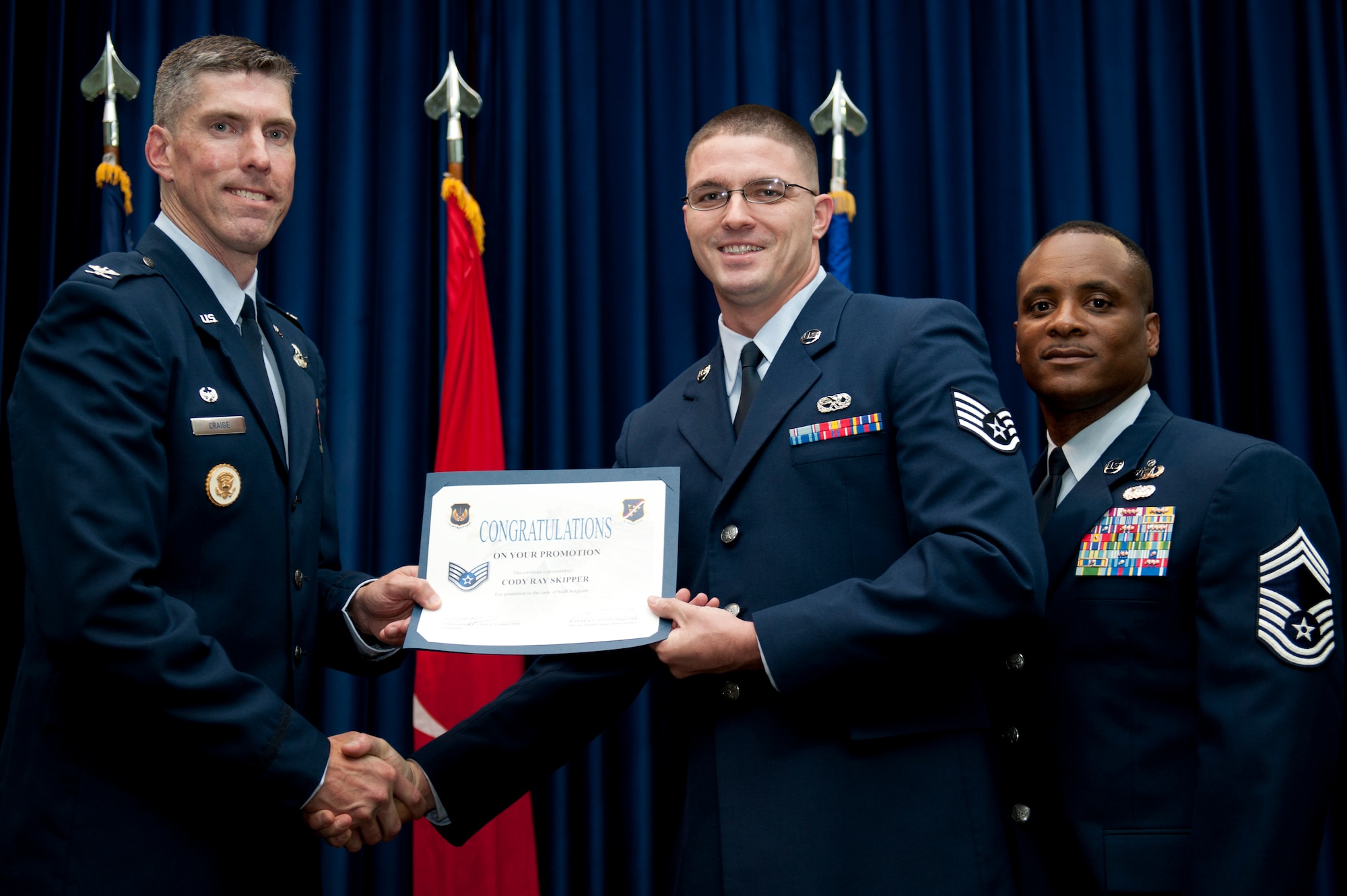 Cody Skipper, 39th Maintenance Squadron, is promoted to the rank of staff sergeant Aug. 31, 2011, at the Club Complex ballroom at Incirlik Air Base, Turkey. (U.S. Air Force photo by Tech. Sgt. Michael B. Keller/Released)