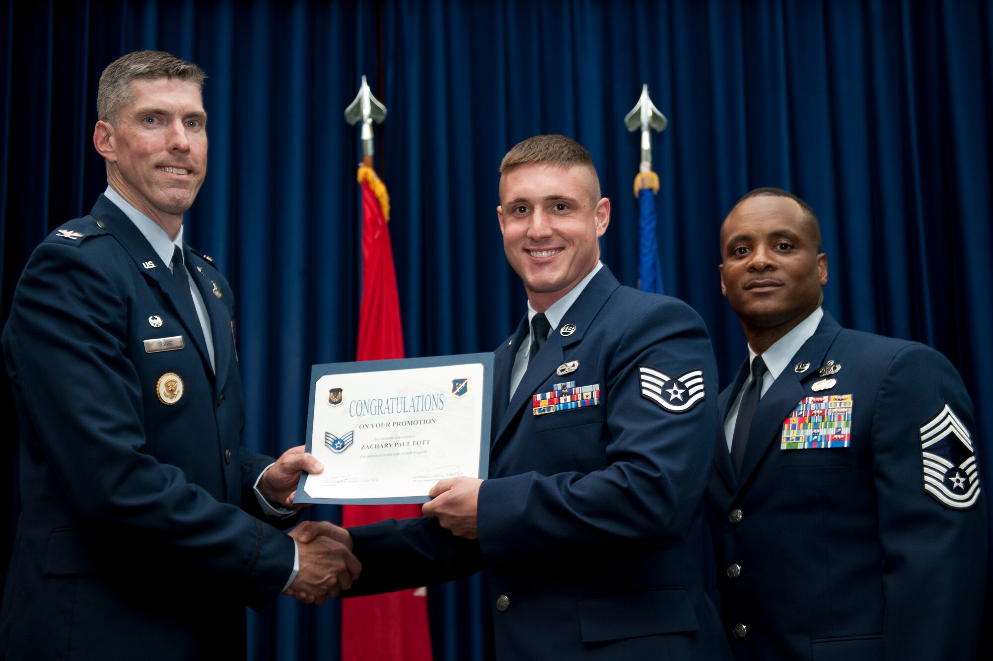 Zachary Lott, 39th Maintenance Squadron, is promoted to the rank of staff sergeant Aug. 31, 2011, at the Club Complex ballroom at Incirlik Air Base, Turkey. (U.S. Air Force photo by Tech. Sgt. Michael B. Keller/Released)