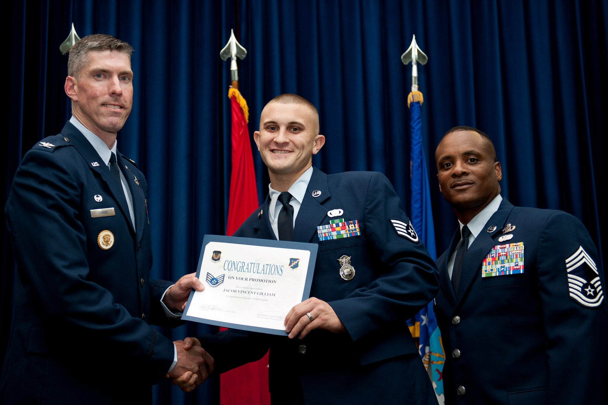 Jacob Gilliam, 39th Security Forces Squadron, is promoted to the rank of staff sergeant Aug. 31, 2011, at the Club Complex ballroom at Incirlik Air Base, Turkey. (U.S. Air Force photo by Tech. Sgt. Michael B. Keller/Released)