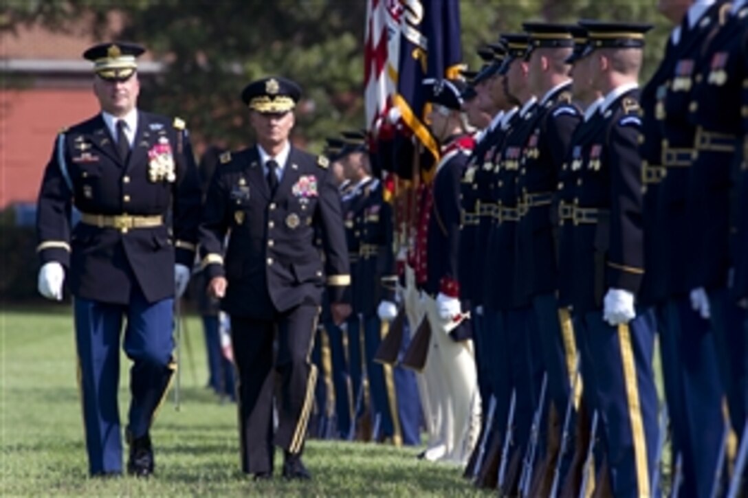 Army Gen. Walter L. "Skip" Sharp inspects the U.S. Army "Old Guard" at his retirement ceremony at Summerall Field on Joint Base Meyer-Henderson Hall, Va., Sept. 1, 2011.