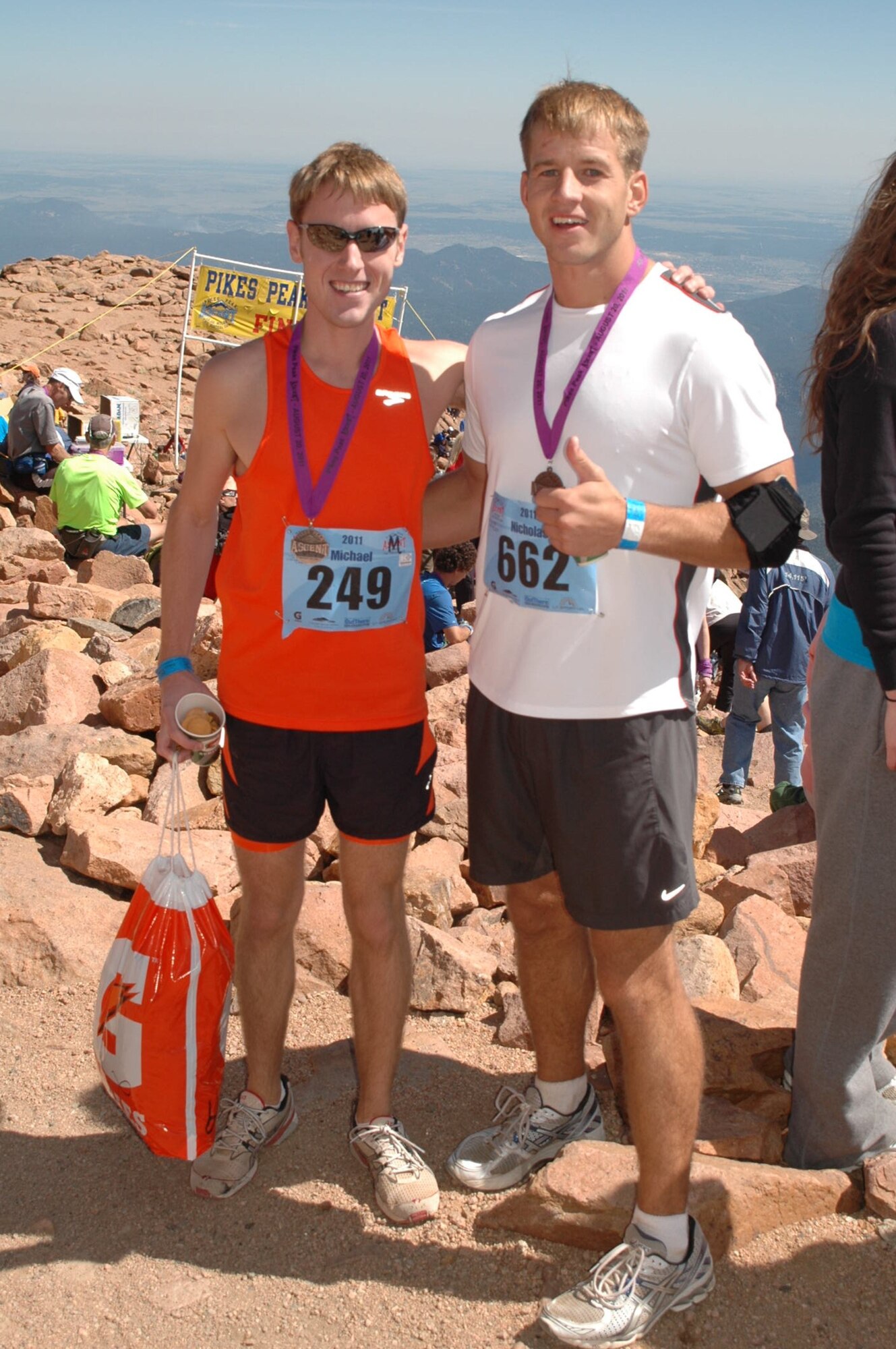 1st Lt. Michael Fleharty and 1st Lt. Nick Kellenbence, 37th Flying Training Squadron Instructor Pilots stand at the finish line of the Pikes Peak Ascent in Colorado Springs, Col. on Aug. 20 after racing 13.32 miles of mountainous terrain with an elevation gain of 7,815 feet. Kellenbence completed the race in 4:03:24 and finished 445 out of 1,704 competitors. Fleharty finished with a time of 3:09:24 and taking 70 out of 1,704 and breaking the30 year-old Mississippi state record for the race of 3:11:54 set back in 1981.