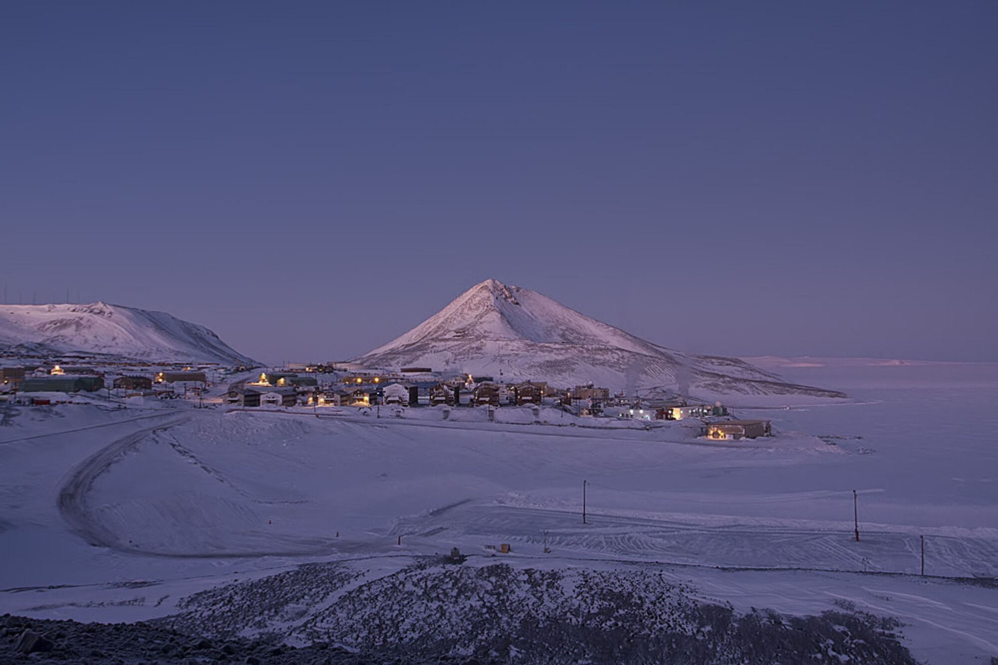 Chief Master Sgt. Michael Beck takes some last photographs of the desolate, yet starkly beautiful landscape of McMurdo Station, Antarctica. The 24 hour darkness is just beginning to give way to an eerie half-light, heralding the arrival of Spring. (Courtesy photo)