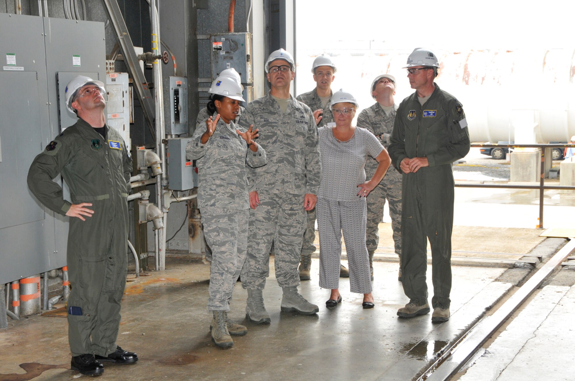 AEDC workers gave Chief Master Sgt. of the Air Force James Roy a tour of base facilities July 15. Chief Roy, the highest enlisted leader in the Air Force, also spoke to the workforce. Pictured from left looking at the size of the base’s 16-foot supersonic wind tunnel are Lt. Col. Lee Davis, 1st Lt. CharMeeka Scroggins, Chief Roy, 1st Lt. John Labouliere, Chief Roy’s wife Paula, 1st Lt. William Edge and AEDC Commander Col. Michael Panarisi. (Photo by Rick Goodfriend)