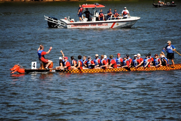 Air University students compete in an earlier race at the second-annual Dragon Boat Festival on the Alabama River. Present Air University students maintain the tradition by competing in this year's Dragon Boat Festival, August 27, 2016. (Air Force photo/Christopher Kratzer)