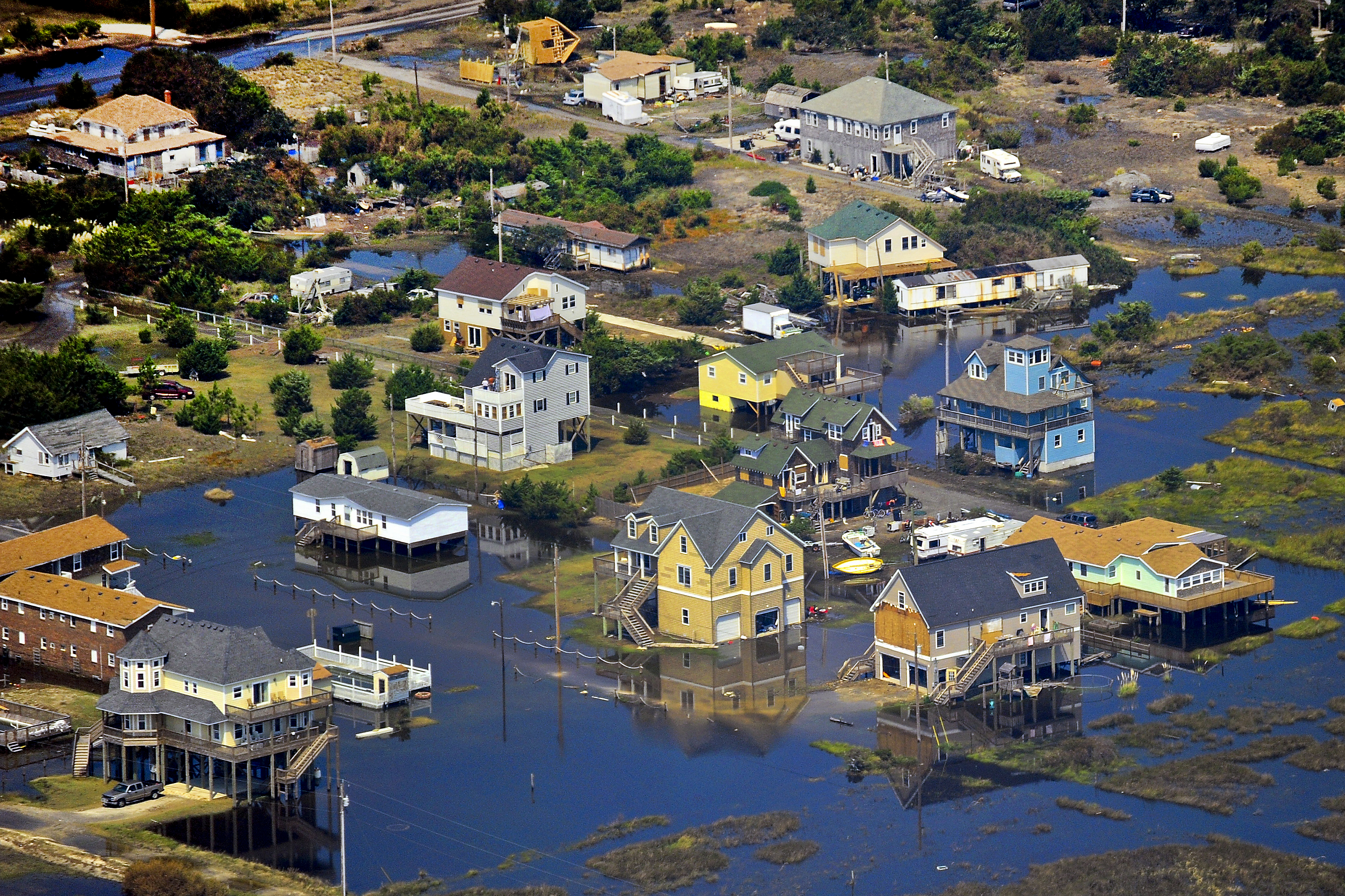 A Coast Guard C 130 Hercules Fixed Winged Aircraft Provides An Aerial View Of Areas Affected
