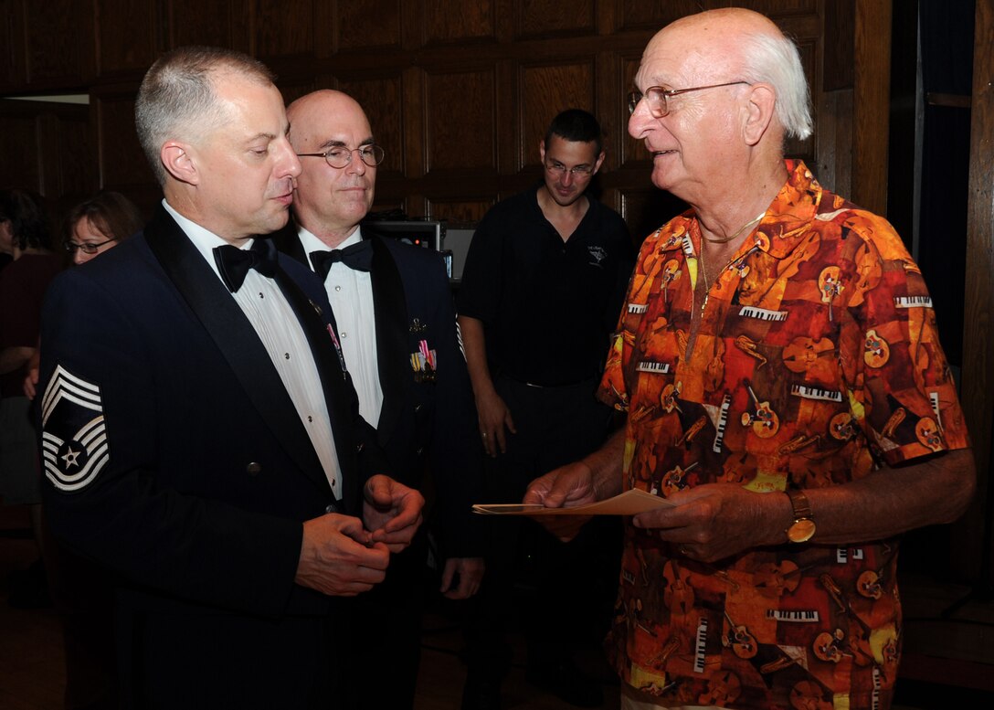 Chief Dudley Hinote, U.S. Air Force Band Airmen of Note trombonist and NCO in charge, and Master Sgt. Steven Erickson, Airmen of Note pianist, meet former Chief Warrent Officer Lewis Anderson, former assistant director of the U.S. Air Force Band, after an Airmen of Note performance at the Stambough Auditorium in Youngstown, Ohio on Sept. 2. Anderson was the assistant director of the Band during the 1950s and he conducted the official Air Force concert band at what is now Joint Base Anacostia-Bolling. (U.S. Air Force photo/ Airman 1st Class Bahja J. Jones)
