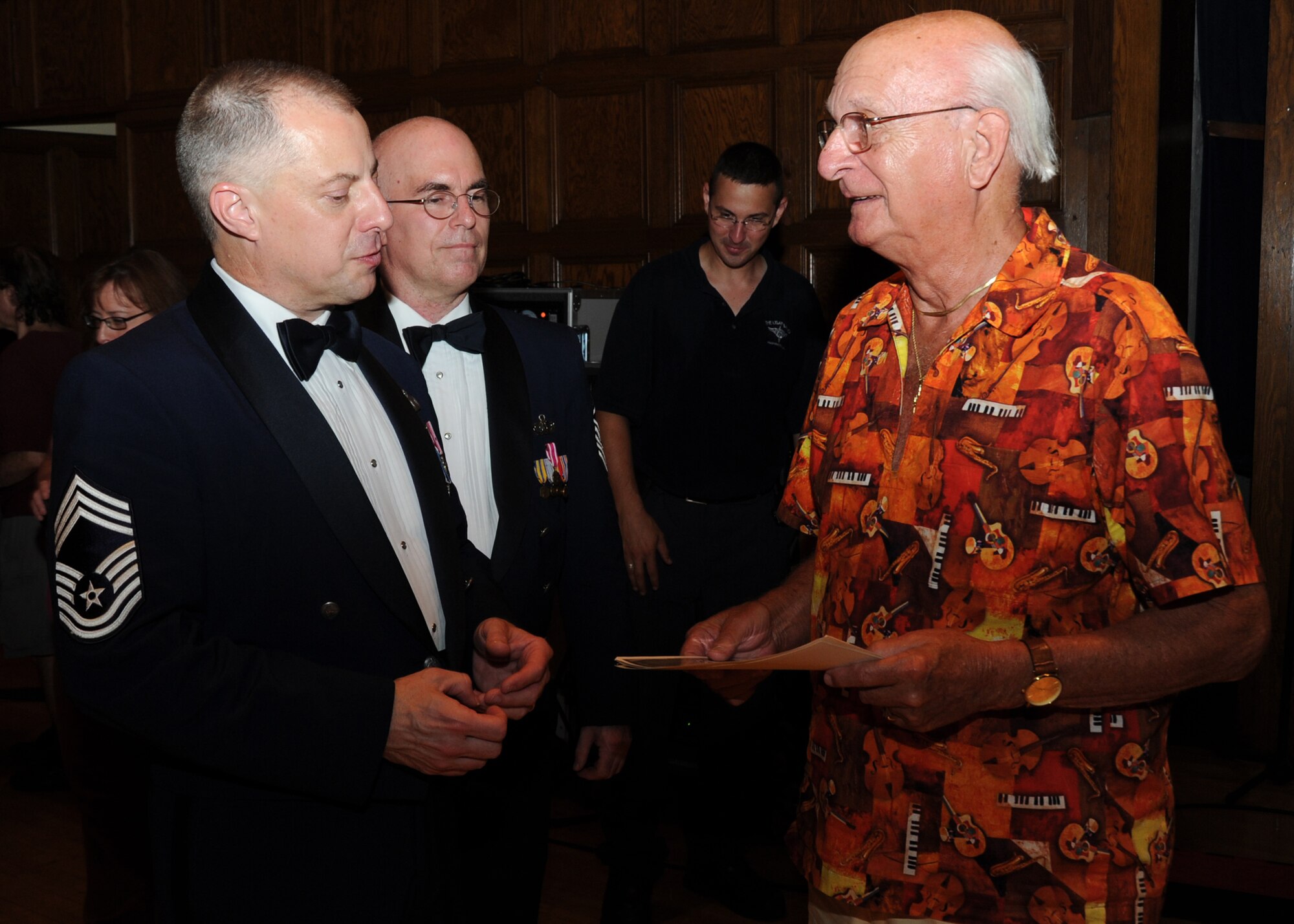 Chief Dudley Hinote, U.S. Air Force Band Airmen of Note trombonist and NCO in charge, and Master Sgt. Steven Erickson, Airmen of Note pianist, meet former Chief Warrent Officer Lewis Anderson, former assistant director of the U.S. Air Force Band, after an Airmen of Note performance at the Stambough Auditorium in Youngstown, Ohio on Sept. 2. Anderson was the assistant director of the Band during the 1950s and he conducted the official Air Force concert band at what is now Joint Base Anacostia-Bolling. (U.S. Air Force photo/ Airman 1st Class Bahja J. Jones)
