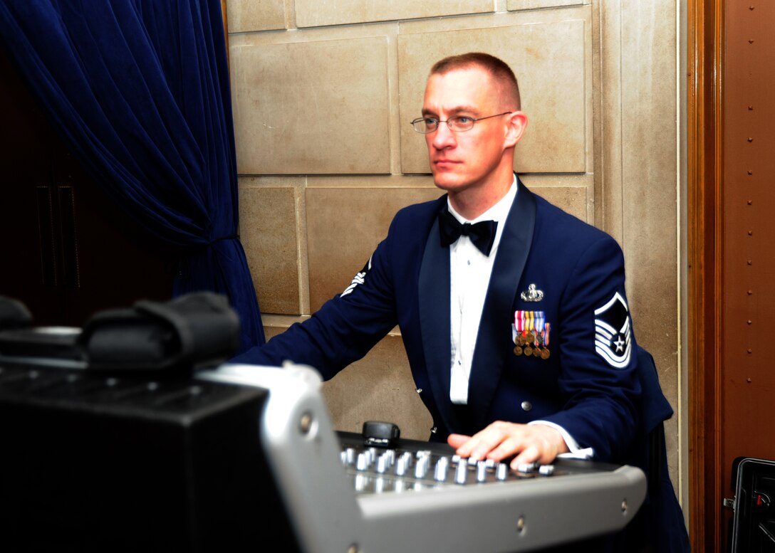 Master Sgt. Mark Hannah, U.S. Air Force Band audio engineer, controls sound levels to ensure the audience hears the best quallity sound during an Airmen of Note performance at the Stambough Auditorium in Youngstown, Ohio on Sept. 2. The performance was the second stop during the Airmen of Note's mini tour of the Midwest, as they make their way to the 2011 Detroit Jazz Festival on Sept. 4. (U.S. Air Force photo/ Airman 1st Class Bahja J. Jones) 