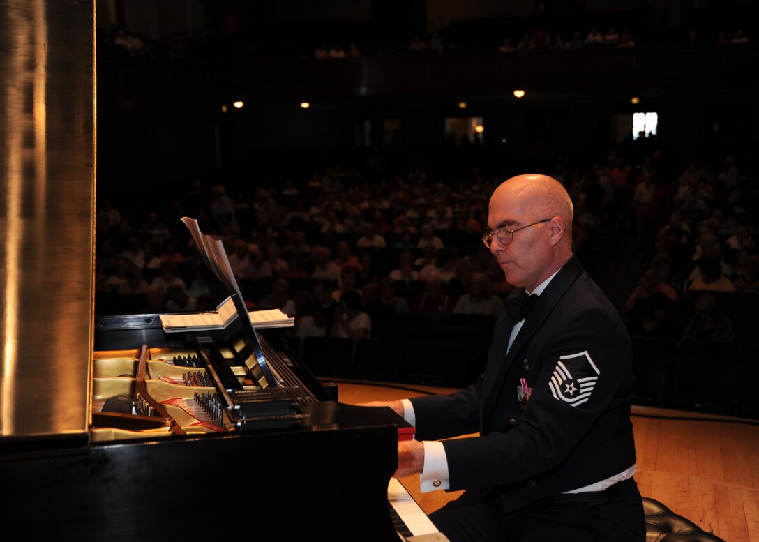 Master Sgt. Steven Erickson, Airmen of Note pianist, warms up before a performance at the Stambough Auditorium in Youngstown, Ohio on Sept. 2. The performance was the second stop during the Airmen of Note's mini tour of the Midwest, as they make their way to the 2011 Detroit Jazz Festival on Sept. 4. (U.S. Air Force photo/ Airman 1st Class Bahja J. Jones) 
