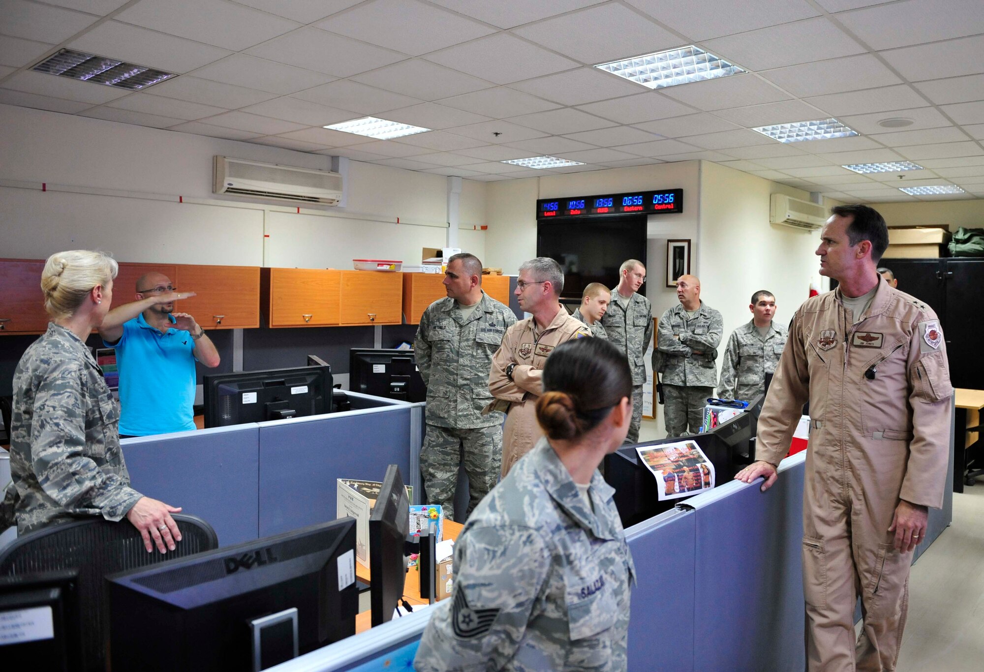 Edward L. Hyde Jr., the lead network administrator III in the Network Operations office, briefs Maj. Gen. James J. Jones on the morale Internet network the 380th Expeditionary Communication Squadron provides for deployed personnel at the 380th Air Expeditionary Wing. Jones is the deputy commander of U.S. Air Forces Central Command, and he visited the base Sep. 2, 2011, to meet with deployed service members and to learn more about how they support the AFCENT mission. (U.S. Air Force photo/Tech Sgt. Patrick Mitchell)