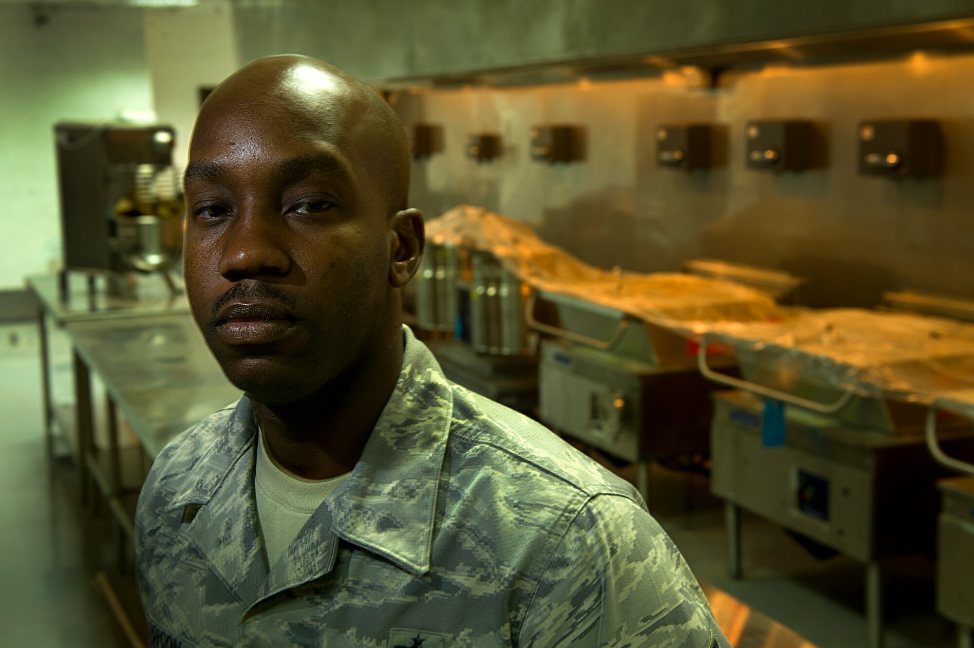 Tech. Sgt. Reginald Morrison, command food services manager for U.S. Air Forces Central Command, arrived at an undisclosed location in Southwest Asia Aug. 15, 2011.  His mission here was to take a dining facility that hasn't served hot meals in several years, and transform it to a fully functional DFAC.  Morrison is a graduate of E.E. Smith Senior High School and native of Fayetteville, N.C. (U.S. Air Force photo by Staff Sgt. David Salanitri/Released)