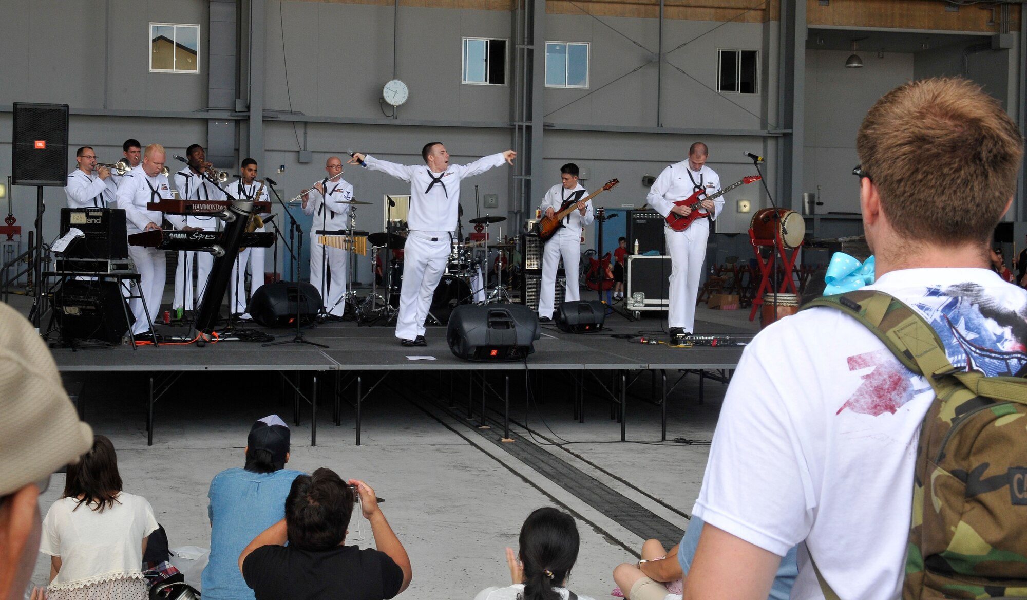MISAWA AIR BASE, Japan—The U.S.  7th Fleet Band from Yokosuka, Japan, sing and play contemporary Japanese music at Misawa’s 32nd annual Air Fest here Sept. 4. The Japan Air Self-Defense Force and the 35th Fighter Wing, with associated tenant units, hosted more than 100,000 attendees. Air Fest 2011 was an opportunity for visitors to see eight aerial demonstrations with 19 static displays of JASDF, U.S. Air Force, U.S. Navy aircraft and private operators. Air Fest 2011 also marked the last flight of Miss Veedol, a single engine aircraft that in 1931 flew non-stop across the Pacific Ocean from Sabishiro Beach, Misawa, Japan to Wenatchee, Washington, U.S. (U.S. Air Force photo/Tech. Sgt. Phillip Butterfield)  