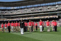 The 2011 Twins Platoon stands at attention during a pregame ceremony in commemoration of the original 1967 Twins Platoon at Target Field, Sept. 5. Twenty four local young men and women were sworn into the U.S. Marine Corps as the "Twins Platoon" in commemoration of the group of 150 who swore in on June 28, 1967.