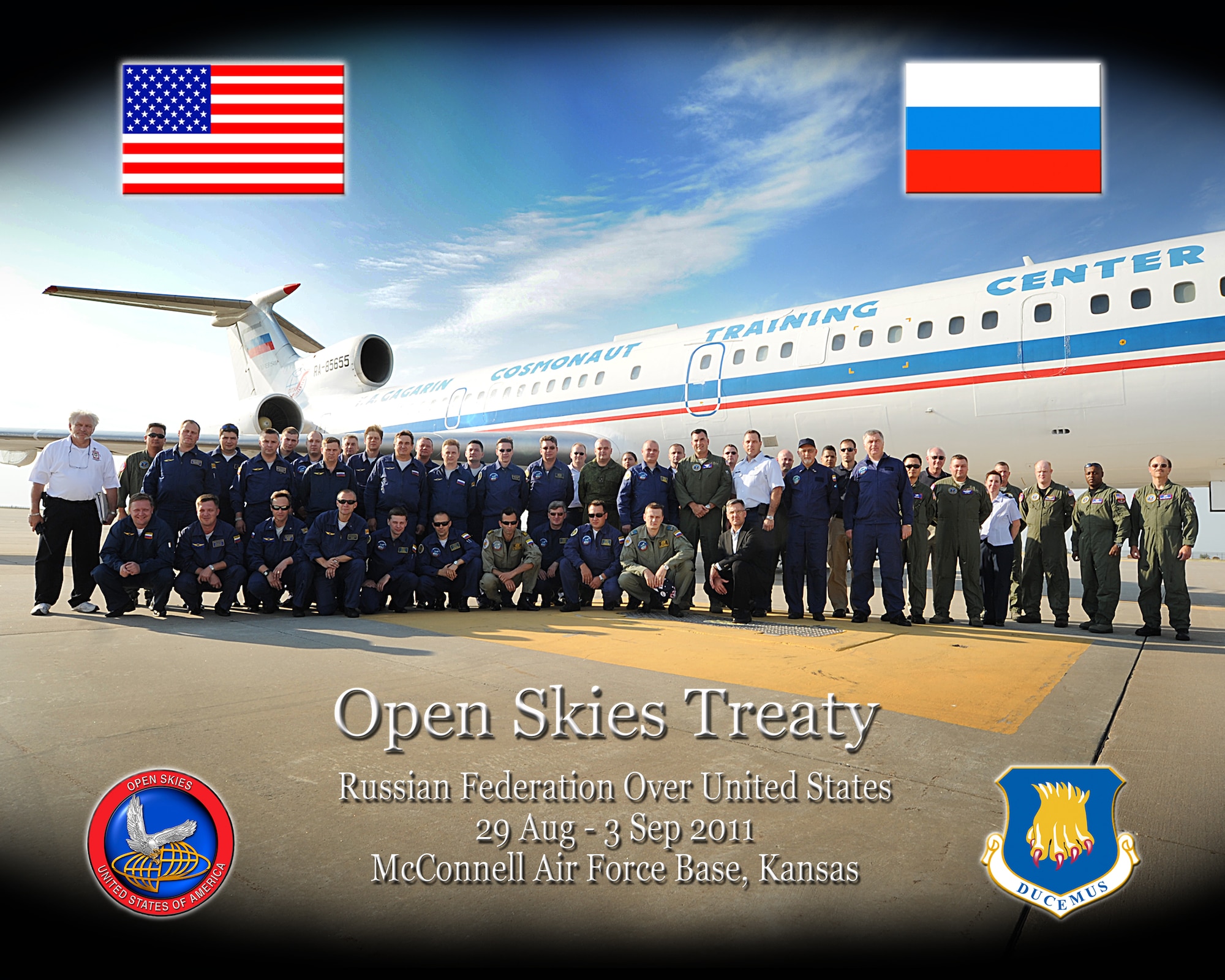 The Open Skies Treaty Russian Federation poses for a group photo in front of a Russian Tu-154M aircraft on McConnell’s flightline Aug. 29, 2011, McConnell Air Force Base, Kan.  Team McConnell hosted the August 2011 Open Skies Treaty Russian Federation mission with 29 Russians and 12 Defense Threat Reduction Agency members.  The Open Skies Treaty is a multi-lateral treaty between 34 countries using unarmed aerial surveillance flights over the entire territory of its participants to promote openness and transparency of military forces and activities.  (U.S. Air Force photo illustration by Senior Airman Maria A. Ruiz) 