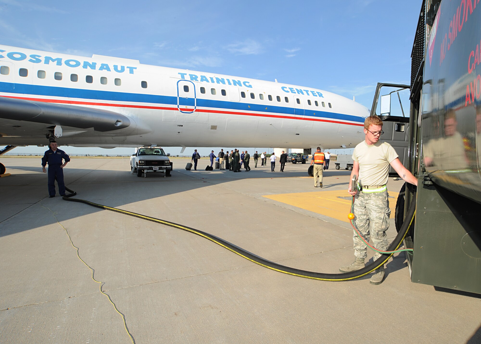 Airman 1st Class Anthony Underwood, 22nd Logistics Readiness Squadron fuels distribution operator, controls refueling operations for a Russian Tu-154M aircraft on McConnell’s flightline Aug. 29, 2011, McConnell Air Force Base, Kan.  Team McConnell hosted the August 2011 Open Skies Treaty Russian Federation twice in 2011.  The Open Skies Treaty was established in 1992 to enhance mutual understanding and confidence by giving participants to gather information about military forces and activities.  (U.S. Air Force photo by Senior Airman Maria A. Ruiz) 