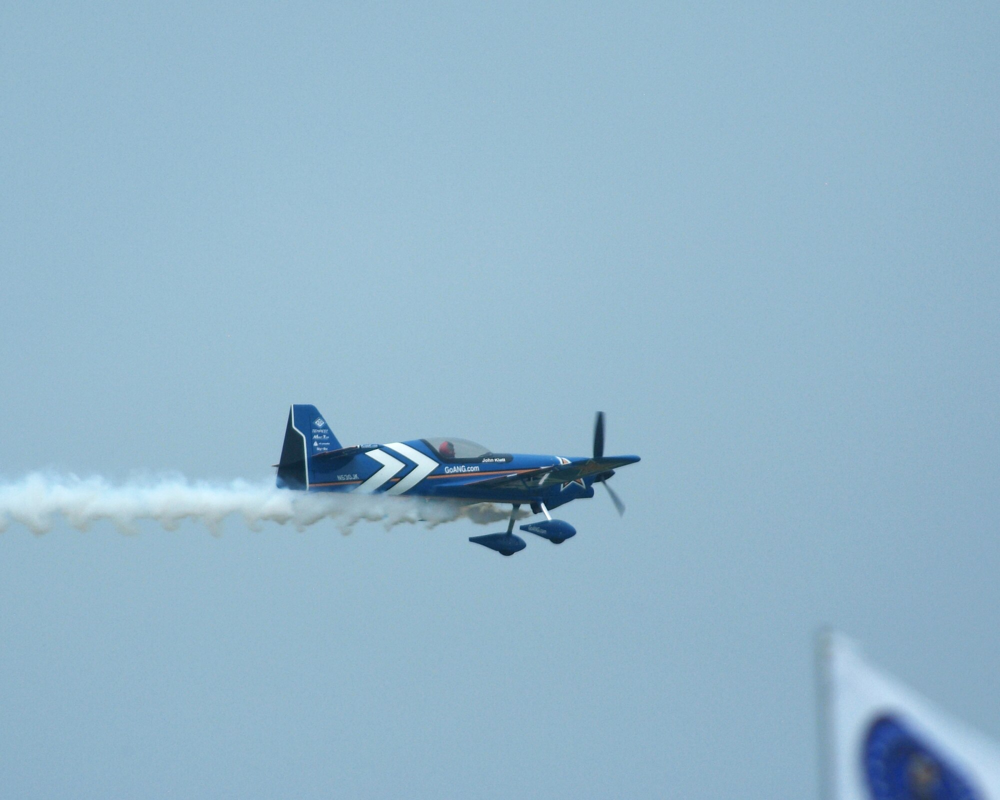 Lt. Col. John Klatt pilots the Air Guard stunt plane above the runway at the Cleveland Air Show in Cleveland Ohio, September 2, 2011. Klatt performs in air shows across the country representing the Air National Guard. (U.S. Air Force Photo by Staff Sgt. Robert J. Koehler)( Released)