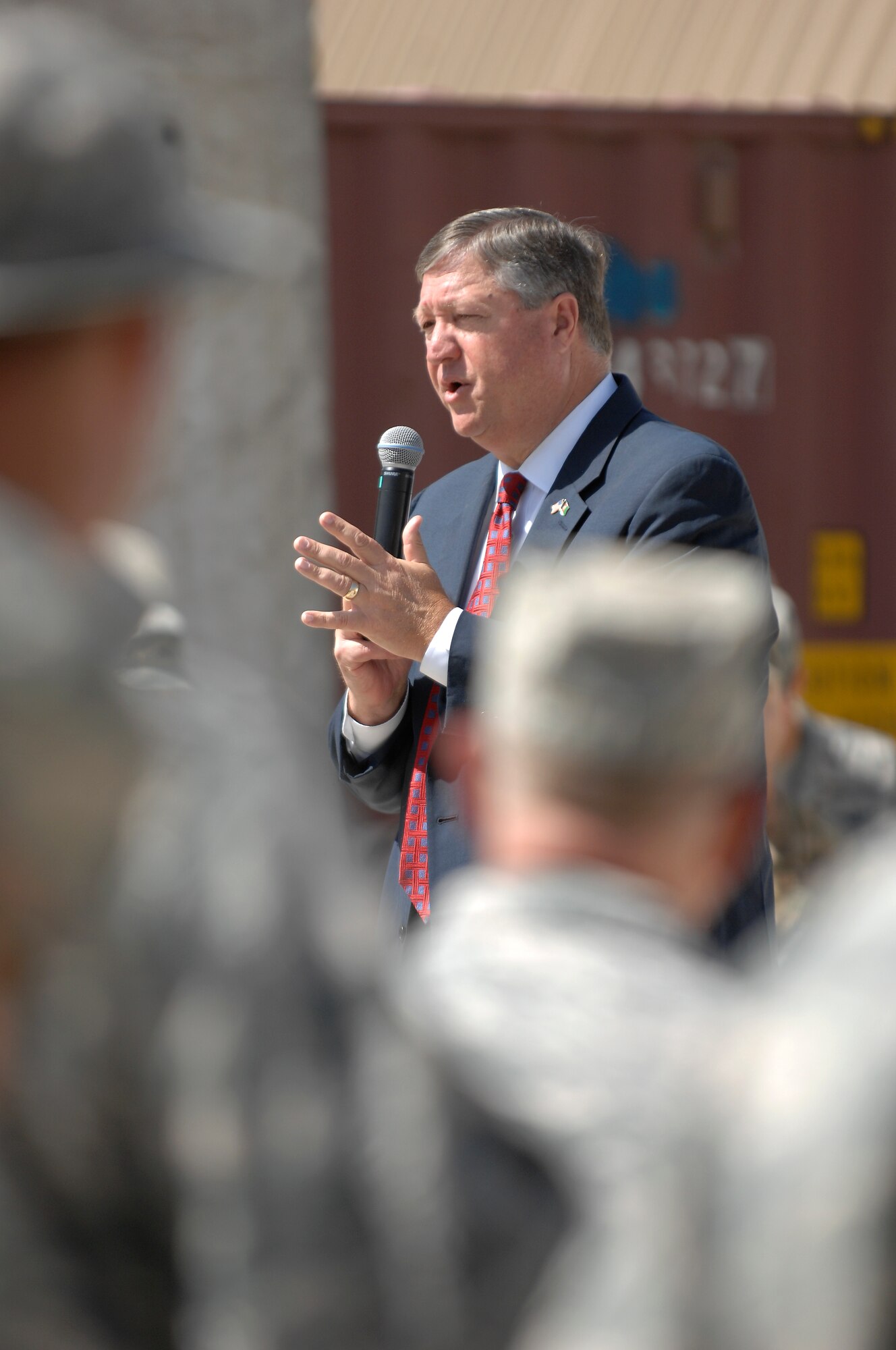 Secretary of the Air Force Michael Donley speaks with Airmen of the 438th Air Expeditionary Wing at Kabul International Airport, Afghanistan, Sept. 4, 2011.  During his Airmen’s Call with the 438th AEW, Donley addressed questions about retirement benefits, current Air Force manning levels and counterinsurgency operations. The secretary was in Afghanistan to meet with Airmen and officials there. (U.S. Air Force photo by Staff Sgt. Matthew Smith)