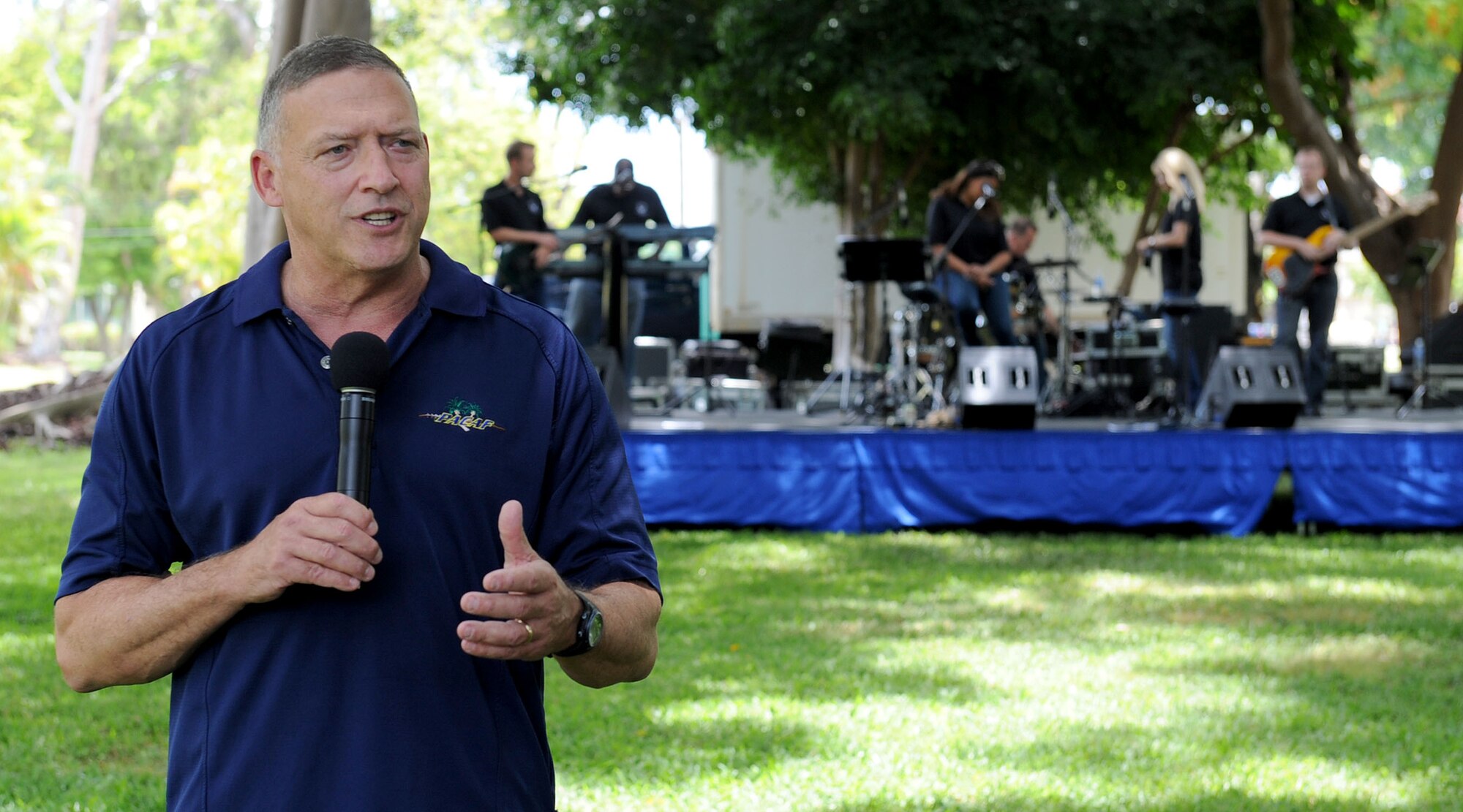 General Gary North, Pacific Air Forces commander, thanks PACAF Airmen and their families for their service and hard work throughout this year during Mahalo Bash 2011, at Joint Base Pearl Harbor-Hickam, Sept. 1.  Mahalo Bash is an annual event hosted by the Pacific Air Forces commander to show appreciation for a job well done. (U.S. Air Force photo/Tech. Sgt. Jerome S. Tayborn (Released))

