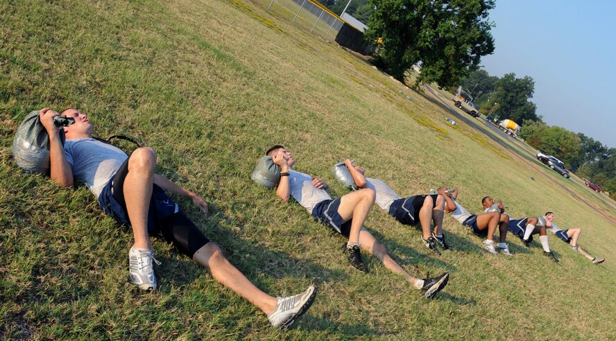 Members of the 2nd Security Forces Squadron at Barksdale Air Force Base, La., prepare for an exercise Sept. 1 during tryouts for the 2 SFS Global Strike Challenge team. The Airmen trying out for the team endure rigorous tests to evaluate their fitness, land navigation skills and marksmanship. (U.S. Air Force photo/2nd Lt. Tori Lalich)(RELEASED)