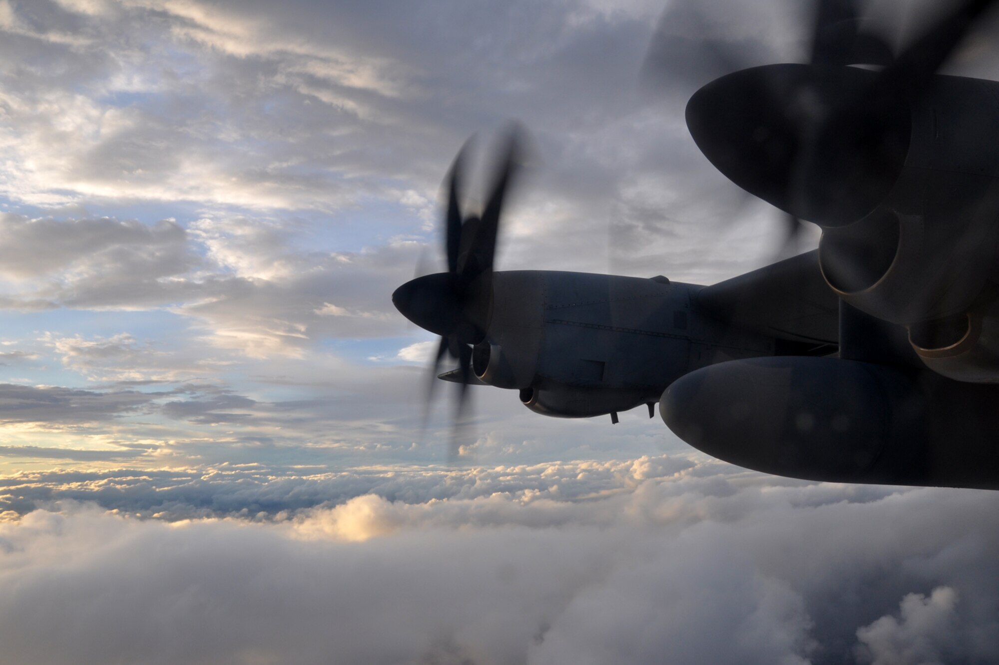 The sun tries to break through the thick clouds surrounding the WC-130J aircraft as it penetrates Tropical Storm Lee Sept. 2. The 53rd Weather Reconnaissance Squadron “Hurricane Hunters,” were gathering atmospheric data to relay to the National Hurricane Center for their forecast models. (U.S. Air Force photo by Staff Sgt. Valerie Smock)