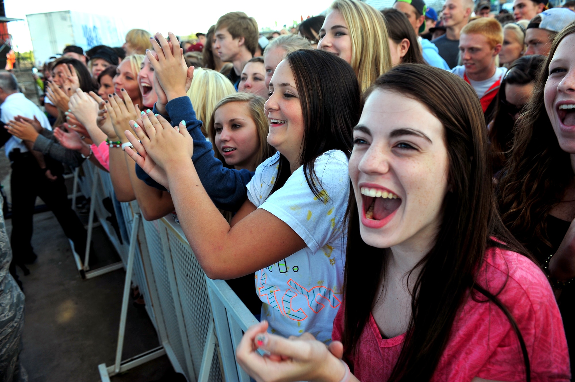 MINOT, N.D. -- Nearly 16,000 people filled the North Dakota State Fairgrounds to watch The Black Eyed Peas perform as part of an event orchestrated by actor and Minot native, Josh Duhamel, to support the flood relief, here Sept. 3. More than 200 Minot AFB Airmen volunteered to set up the electrifying evening, as a night of celebrity-filled fun comforted many Minot residents and Airmen who are still recovering from the tragic flood’s aftermath that displaced one-fourth of the city. All concert proceeds will go to the Minot Area Community Foundation’s Minot Area Recovery Fund to assist victims in Minot and surrounding flood affected communities. (U.S. Air Force Photo/ Senior Airman Jesse Lopez)