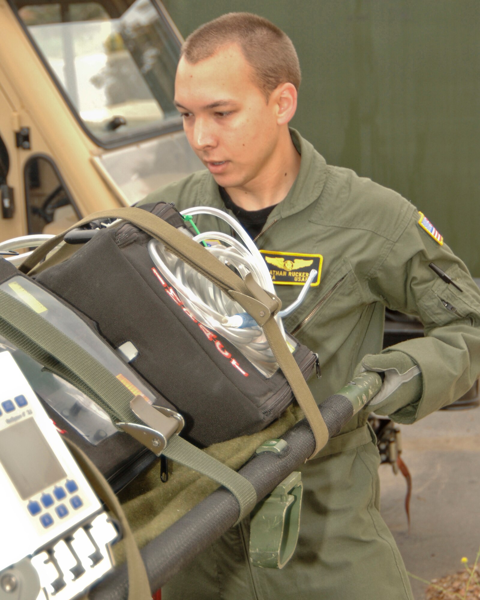 Senior Airman Nathan Rucker prepares to load a litter into a transport for a training exercise used by the 146th Aeromedical Evacuation Squadron at the 146th Airlift Wing Port Hueneme, Calif. August 10, 2011. Senior Airman Rucker is the 146th Airlift Wing's Featured Airman of the Month during the month of September 2011. (U.S. Air Force photo by Airman 1st Class Nicholas Carzis)