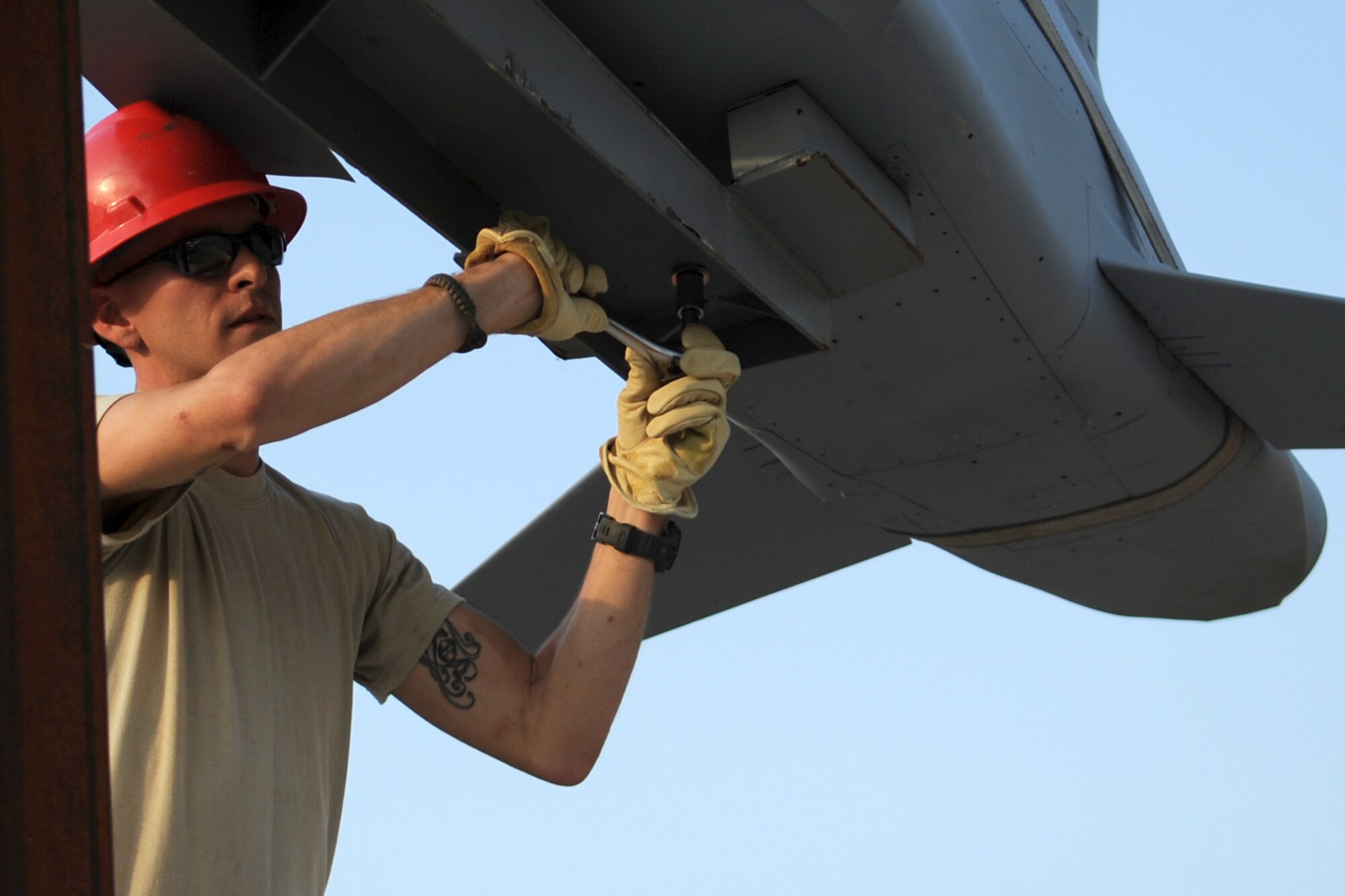 U.S. Air Force Staff Sgt. Michael Sullivan, a 307th Rapid Engineer Deployable Heavy Operational Repair Squadron Engineers specialist, (RED HORSE) secures a Conventional Air Launched Cruise Missile (CALCM) replica onto its pedestal at Barksdale Air Force Base, La., Aug. 31, 2011. The CALCM is the center piece of a monument dedicated to the weapon system and is scheduled to be unveiled on Sept. 9, 2011. (U.S. Air Force photo by Master Sgt. Greg Steele/Released)