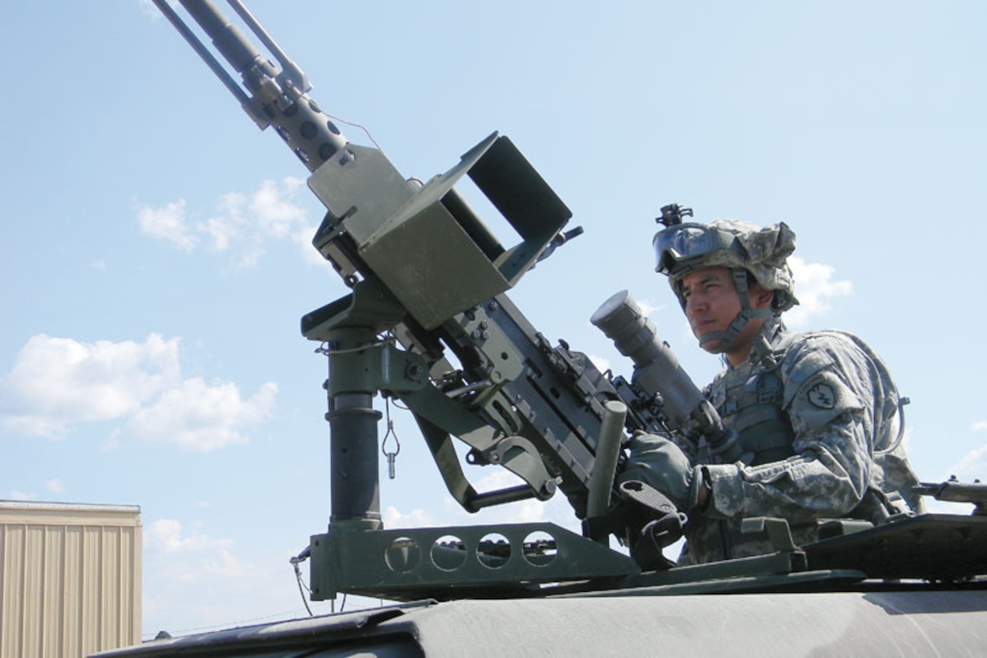 Spc. David Rufenacht, 1st Squadron (Airborne), 40th Cavalry Regiment, 4th Brigade Combat Team (Airborne), 25th Infantry Division, performs gunner duties during training at the Joint Readiness Training Center at Fort Polk, La.  (U.S. Army photos/Staff Sgt. Mark Shrewsbury)
