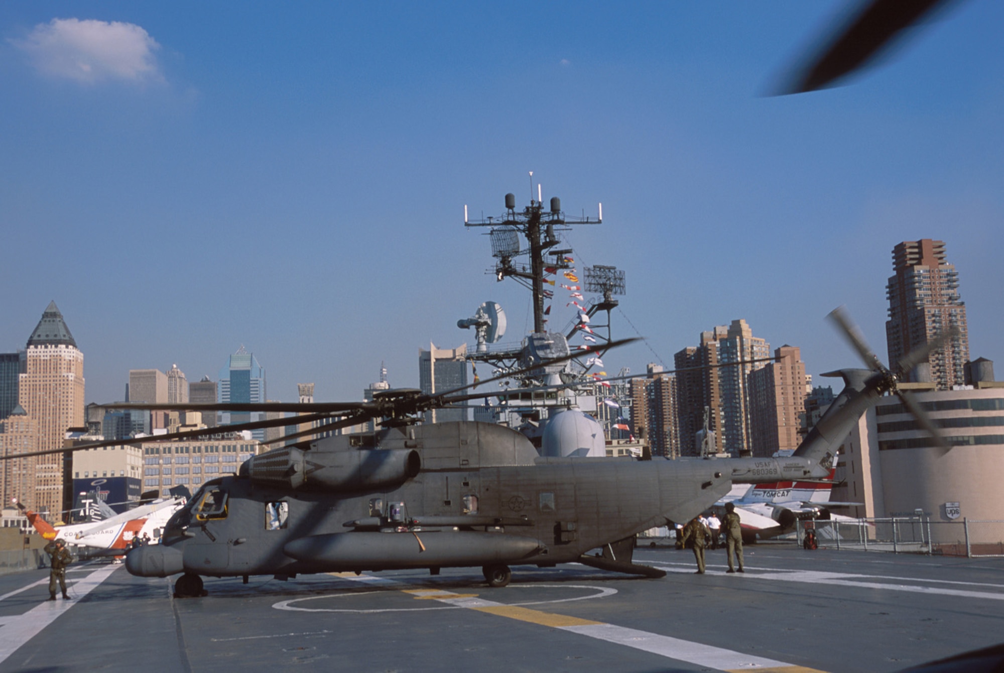 An MH-53, Air Force Special Operations helicpoter from Hurlburt Field, Fla., lands on the USS Intrepid Sea and Air Space Museum in Manahattan from McGuire Air Force Base, N.J., Sept. 13, 2001. The aircraft are being used for relief operations to lower Manhattan, in the wake of the terrorist attacks on the World Trade Center in New York City. (U.S. Air Force photo by Gary Ell) (Released
