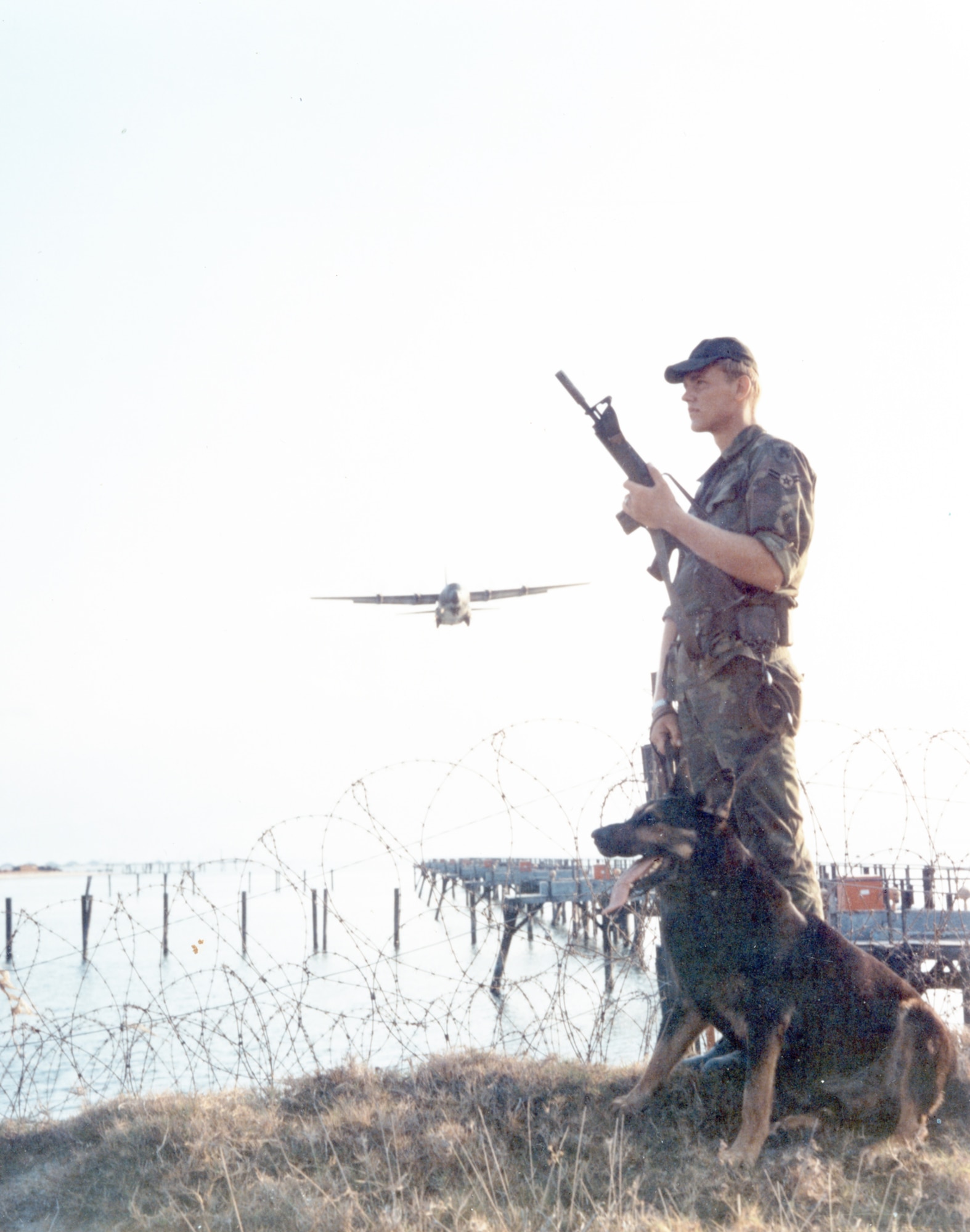 U.S. Air Force dog handlers provided a unique and critical capability in defending air bases against attack. (U.S. Air Force photo).