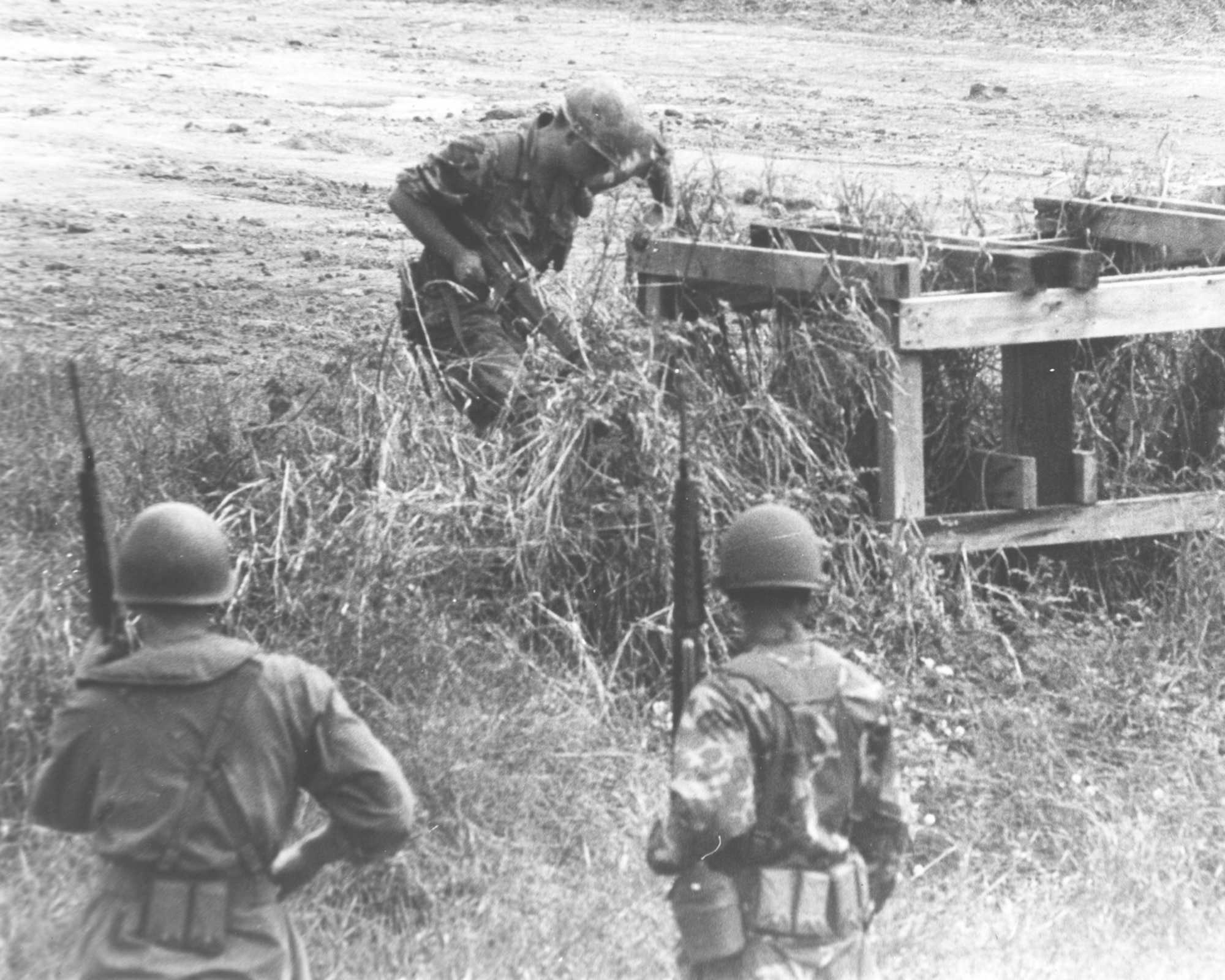 Air Police search for remaining enemy troops the morning after an attack on Tan Son Nhut in December 1966. (Images courtesy of the Security Forces Museum).