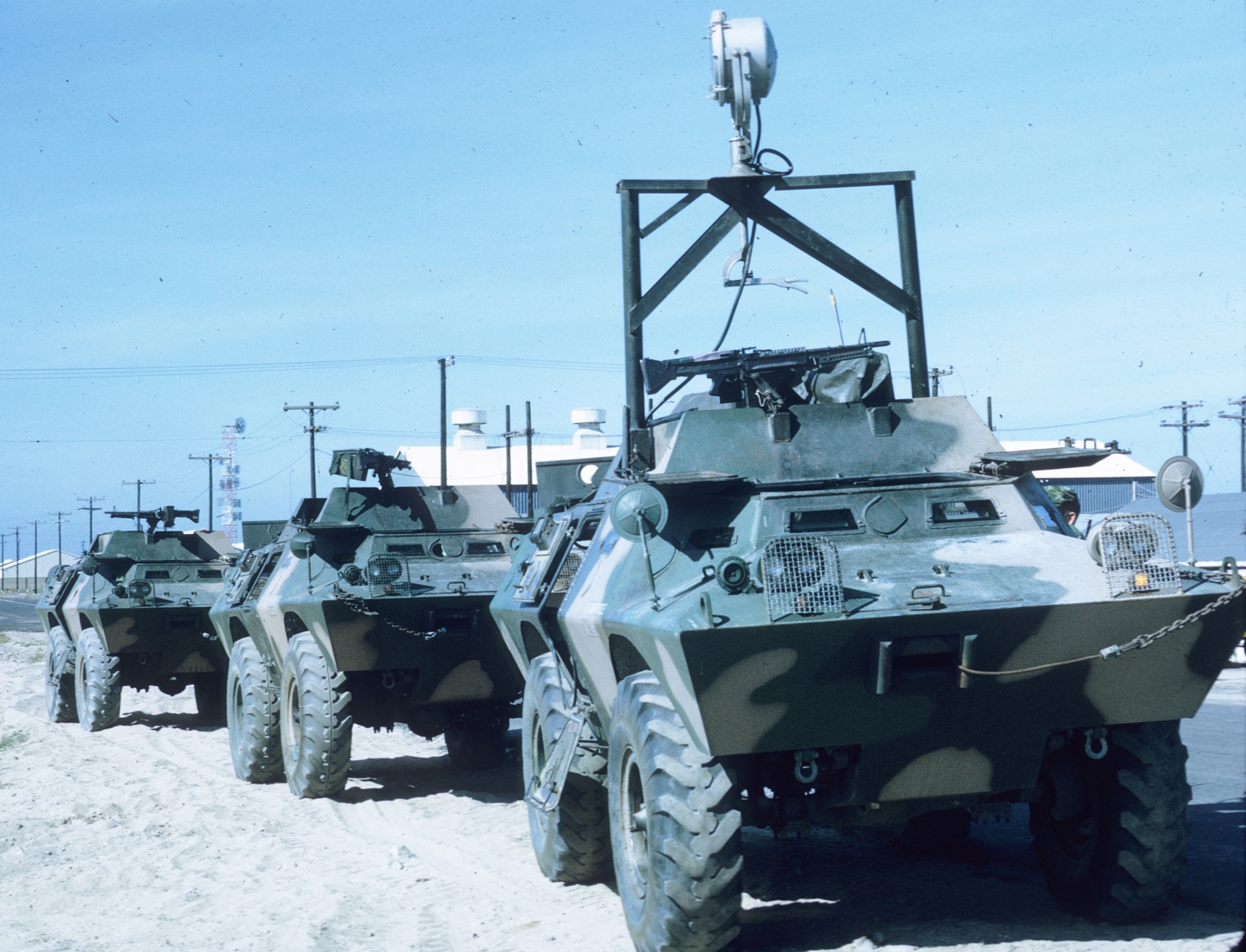 Security Police finally started receiving badly-needed armored vehicles in late 1968.  Pictured here are V-100 armored personnel carriers. The one in the front is also equipped with a searchlight. (U.S. Air Force photo).