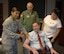 Dr. Steve Butler, Air Force Materiel Command executive director, received a flu shot Sept. 6 while AFMC Commander Gen. Donald Hoffman and his wife, Jackie, look on. The three gathered for their shots to help get spread the word that AFMC civilians will be offered flu shots in the coming the weeks. Mrs. Hoffman emphasized the importance of military family members getting their shots, as well. Dr. Butler's shot was administered by Technical Sgt. Victoria Gray of the 88th Medical Group at Wright-Patterson AFB. (U.S. Air Force photo/Ron Fry)
