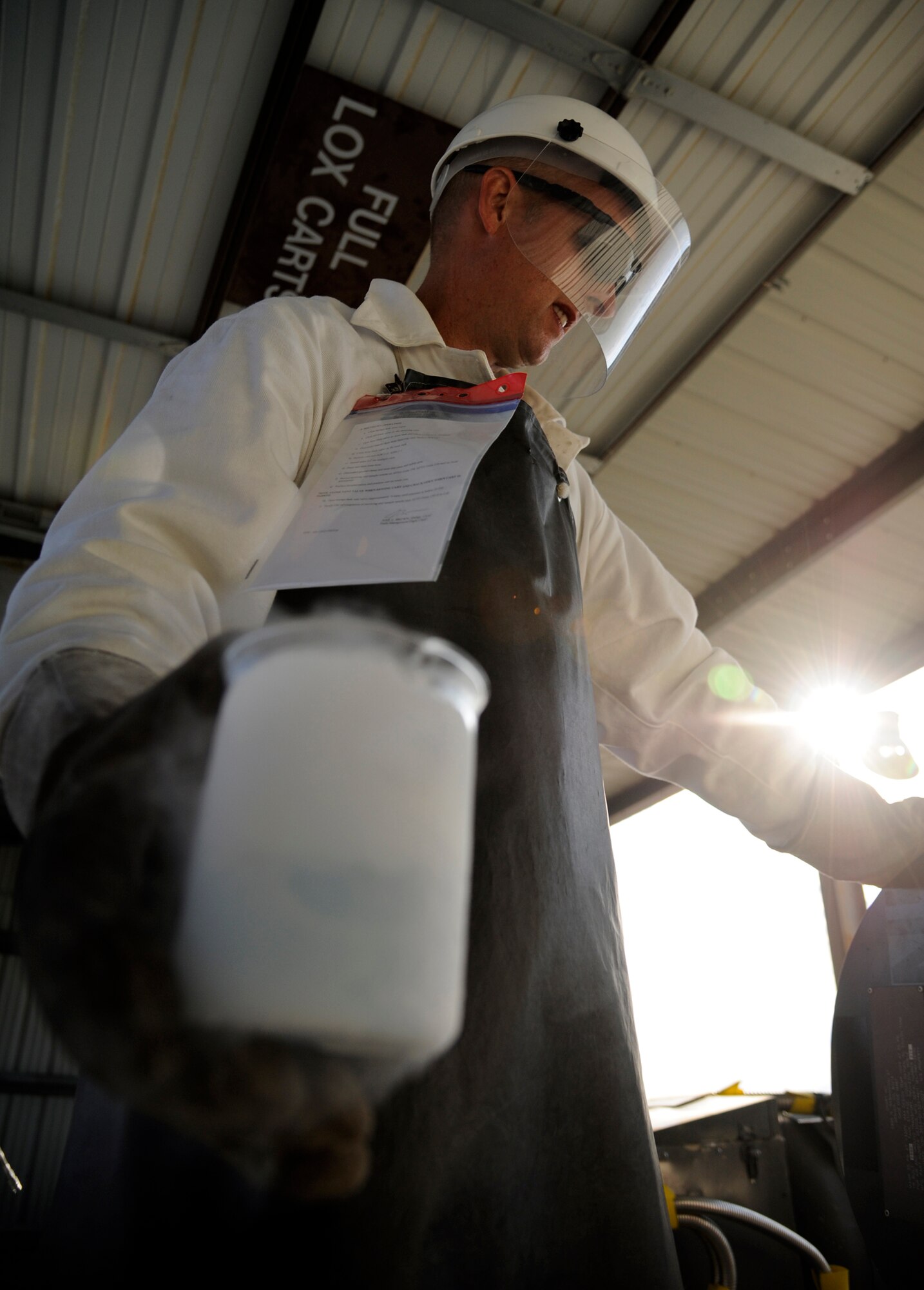 WHITEMAN AIR FORCE BASE, Mo. - Master Sgt. Daniel Koch, 509th Logistics Readiness Squadron fixed-facilities fuels technician, tests the quality of oxygen Aug. 29 ensuring pilots are safe and able to breathe while flying. The fixed facility shop is a part of fuels and handles cryogenics (pilot oxygen tanks), base service systems (fuel for government vehicles) and hydrant systems (fuel being sent to and received from flightline docks). (U.S. Air Force photo/Airman 1st Class Cody H. Ramirez)