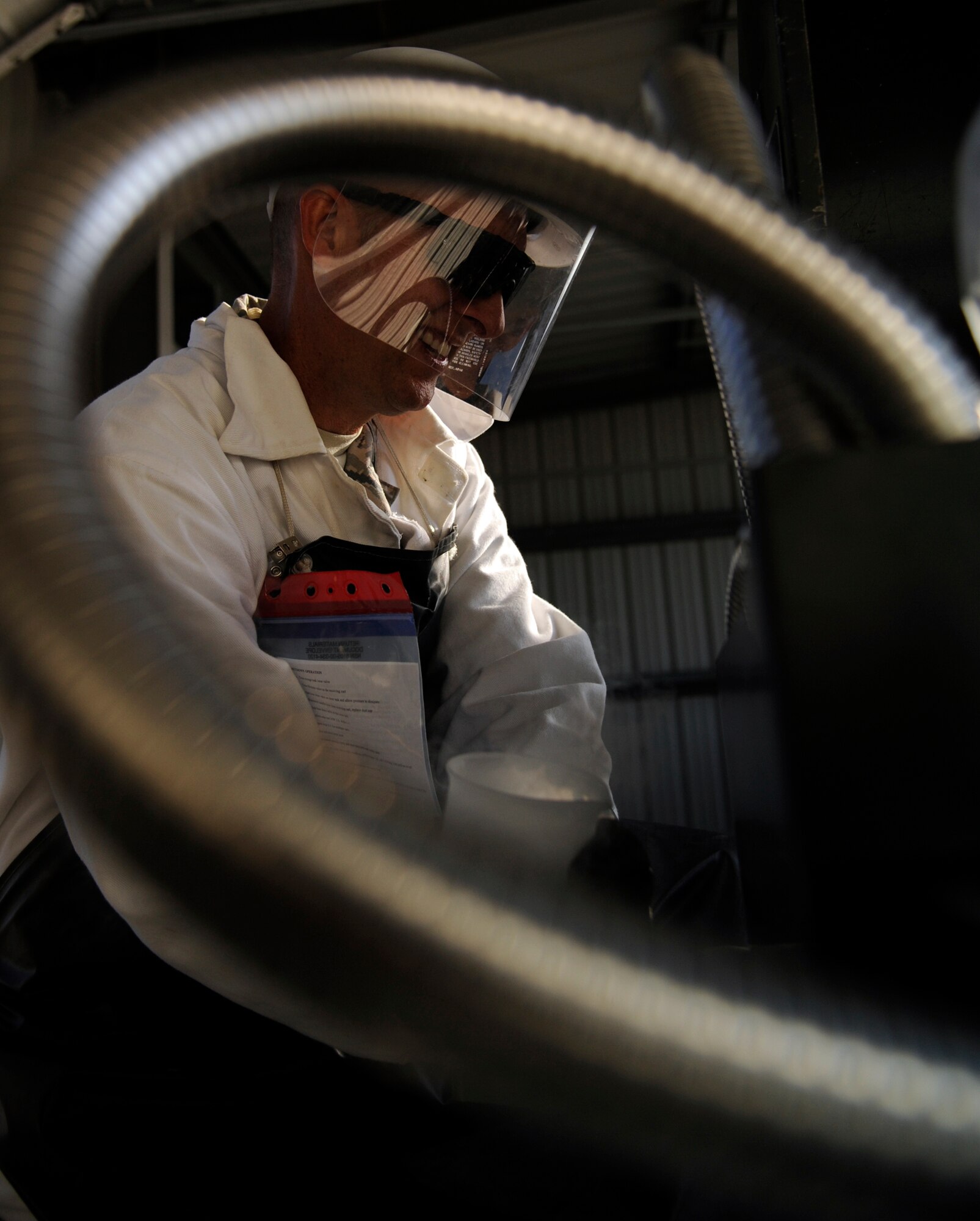 WHITEMAN AIR FORCE BASE, Mo. - Master Sgt. Daniel Koch, 509th Logistics Readiness Squadron fixed-facilities fuels technician, checks the air quality in an oxygen tank here Aug. 31 ensuring the safety of B-2 Spirit and T-38 Talon pilots here. The fixed facility shop is a part of fuels and handles cryogenics (pilot oxygen tanks), base service systems (fuel for government vehicles) and hydrant systems (fuel being sent to and received from flightline docks). (U.S. Air Force photo/Airman 1st Class Cody H. Ramirez)