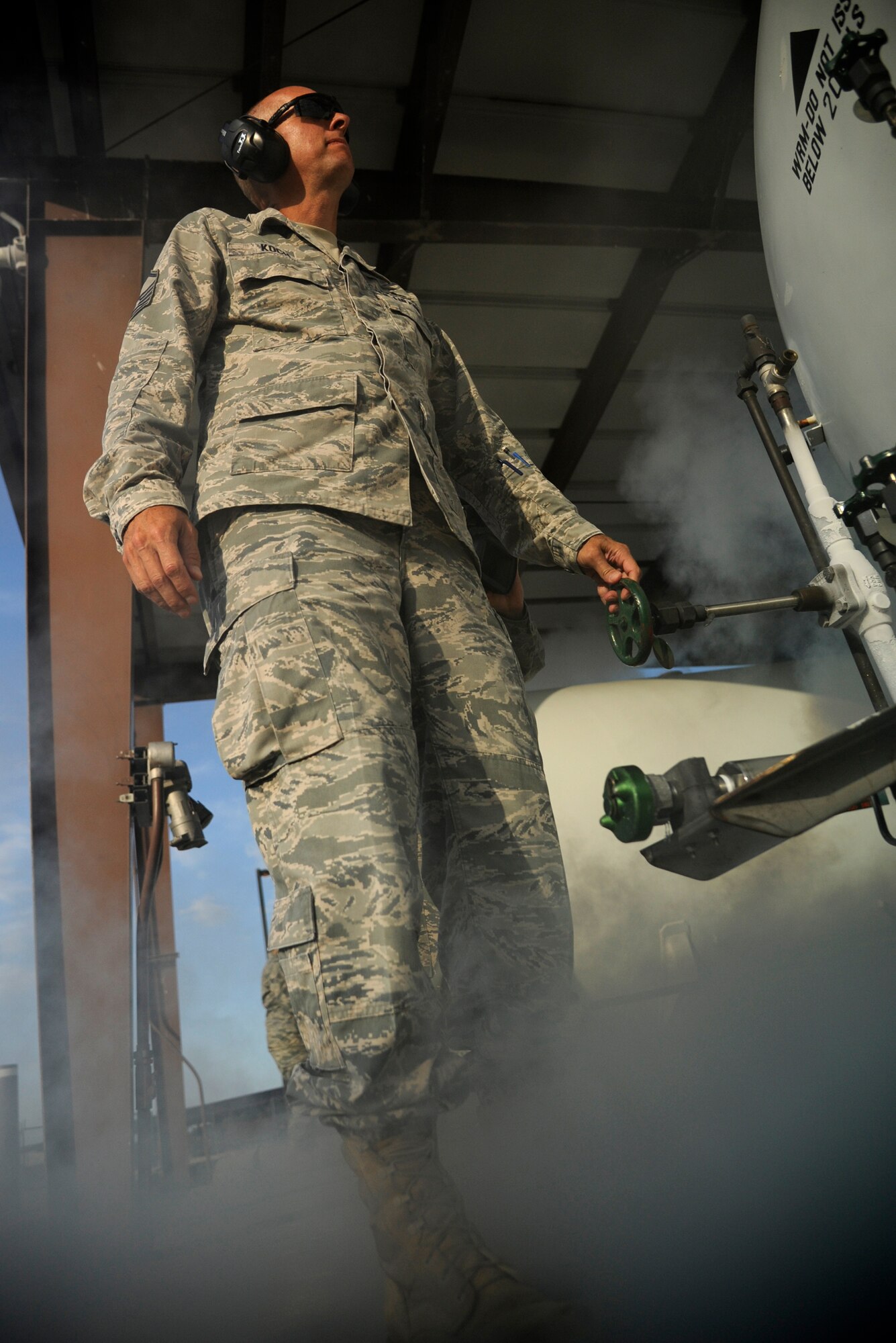 WHITEMAN AIR FORCE BASE, Mo. - Master Sgt. Daniel Koch, 509th Logistics Readiness Squadron fixed-facilities fuels technician, bleeds an oxygen tank here Aug. 31. The fixed-facility shop is a part of fuels and handles cryogenics (pilot oxygen tanks), base service systems (fuel for government vehicles) and hydrant systems (fuel being sent to and received from flightline docks). (U.S. Air Force photo/Airman 1st Class Cody H. Ramirez)