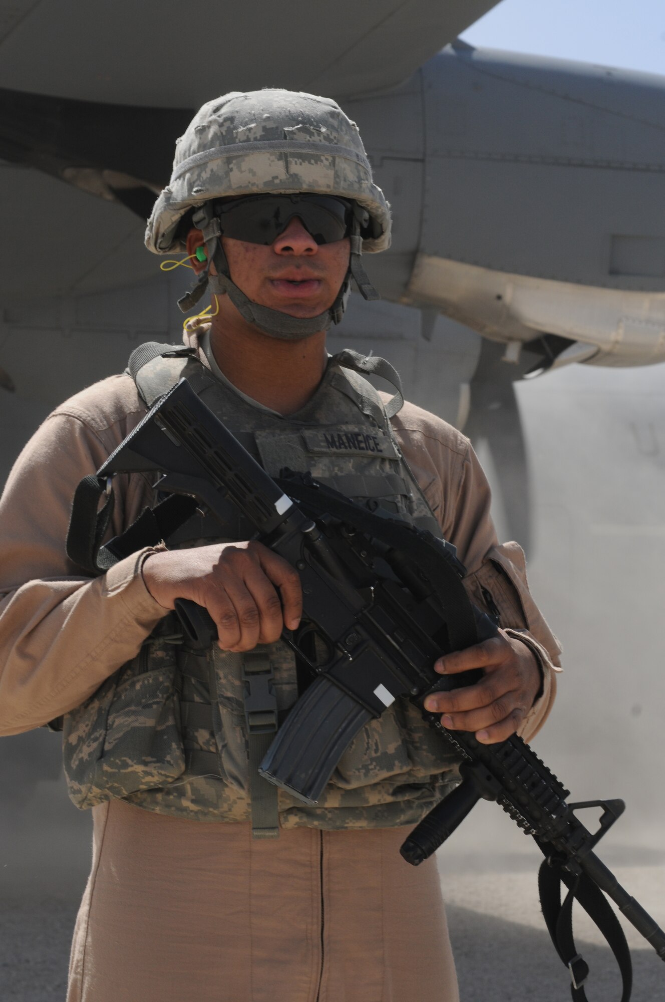 BAGRAM AIRFIELD, Afghanistan – Airman 1st Class Dominique Maniece, 455th Expeditionary Security Forces Squadron Fly Away Security Team member, provides security for a C-130J Hercules aircraft, Sept. 9. Maniece is stationed at Altus Air Force Base, Okla. (U.S. Air Force photo/Senior Airman Krista Rose)