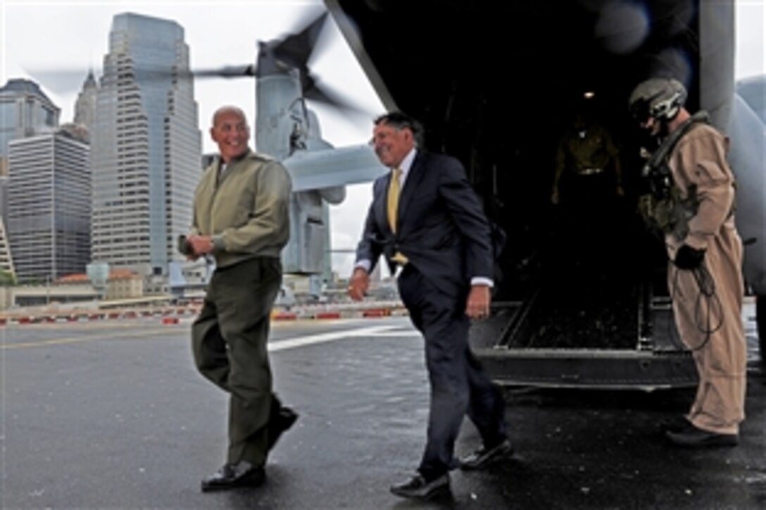 Defense Secretary Leon E. Panetta steps off a V-22 Osprey as he arrives in New York to meet with New York Mayor Michael Bloomberg and visit 9/11 sites, Sept. 6, 2011.