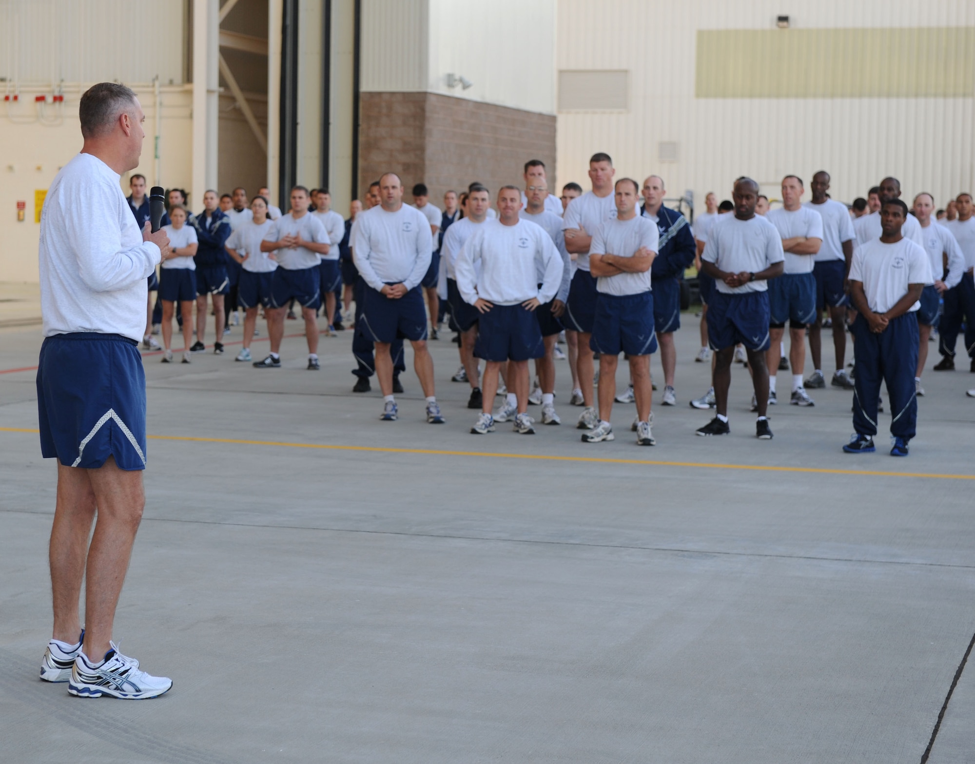 Col. Mike Minihan, 19th Airlift Wing commander, speaks to Team Little Rock members before the “Run to Remember” Sept. 7, 2011, on Little Rock Air Force Base, Ark., to mark the 10-year anniversary of the terrorist attacks on Sept. 11, 2001.The event gave base personnel the opportunity to boost morale and camaraderie while completing a two-mile run. (U.S. Air Force photo by Senior Airman Caleb Pierce) 