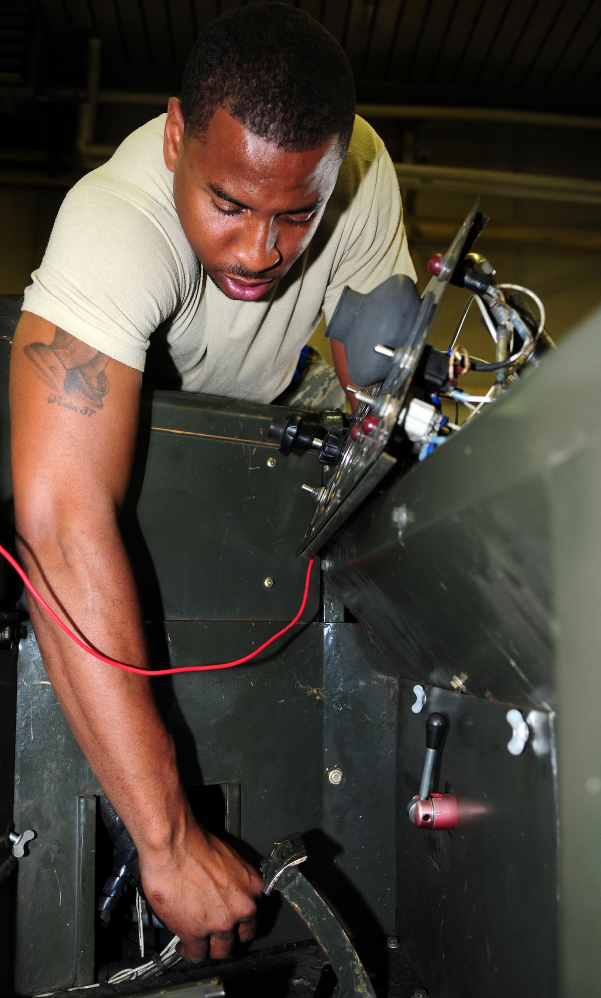 SPANGDAHLEM AIR BASE, Germany – Staff Sgt. Antwan Short, 52nd Equipment Maintenance Squadron aerospace ground equipment craftsman, rewires a control panel on an MJ-1B bomb lift here Sept. 6. The aerospace ground equipment flight is responsible for providing and maintaining both powered and non-powered AGE to support the 52nd Fighter Wing’s flying operations. (U.S. Air Force photo/Airman 1st Class Matthew B. Fredericks)