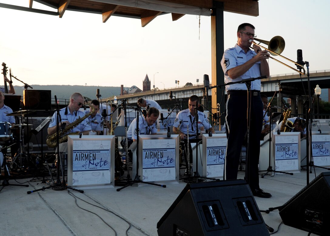 Senior Master Sgt. Joe Jackson, Airmen of Note lead trombonist and musical director, plays a solo during an Airmen of Note performance at the Canal Place Festival Grounds in Cumberland, Md. on Sept. 1. This was the first stop the Airmen of Note made during their mini tour through the Midwest, leading up to their performance at the 2011 Detroit Jazz Festival. (U.S. Air Force photo/ Airman 1st Class Bahja J. Jones) 
