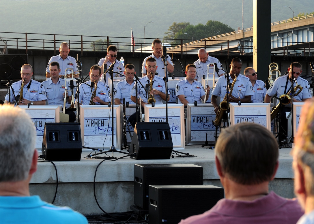 A Cumberland, Md. audience looks on during a performance by the U.S. Air Force Band's premier jazz ensemble, the Airmen of Note, at the Canal Place Festival Grounds on Sept. 1. This was the first stop the Airmen of Note made during their mini tour through the Midwest, leading up to their performance at the 2011 Detroit Jazz Festival. (U.S. Air Force photo/ Airman 1st Class Bahja J. Jones)  
