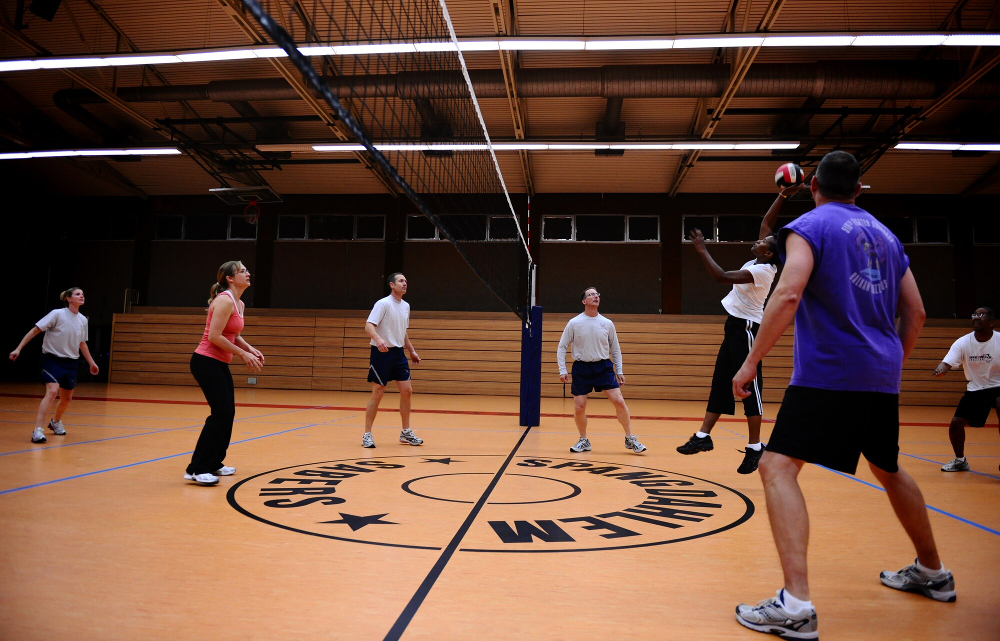 SPANGDAHLEM AIR BASE, Germany -- Priscilla Bolding, Spangdahlem Chiefs, returns the ball over the net during a friendly volleyball match against the Spangdahlem Commanders at the Skelton Memorial Fitness Center here Aug. 30. The Chiefs defeated the Commanders 15-12 the first game and 15-3 the second game. (U.S. Air Force photo/Staff Sgt. Nathanael Callon)